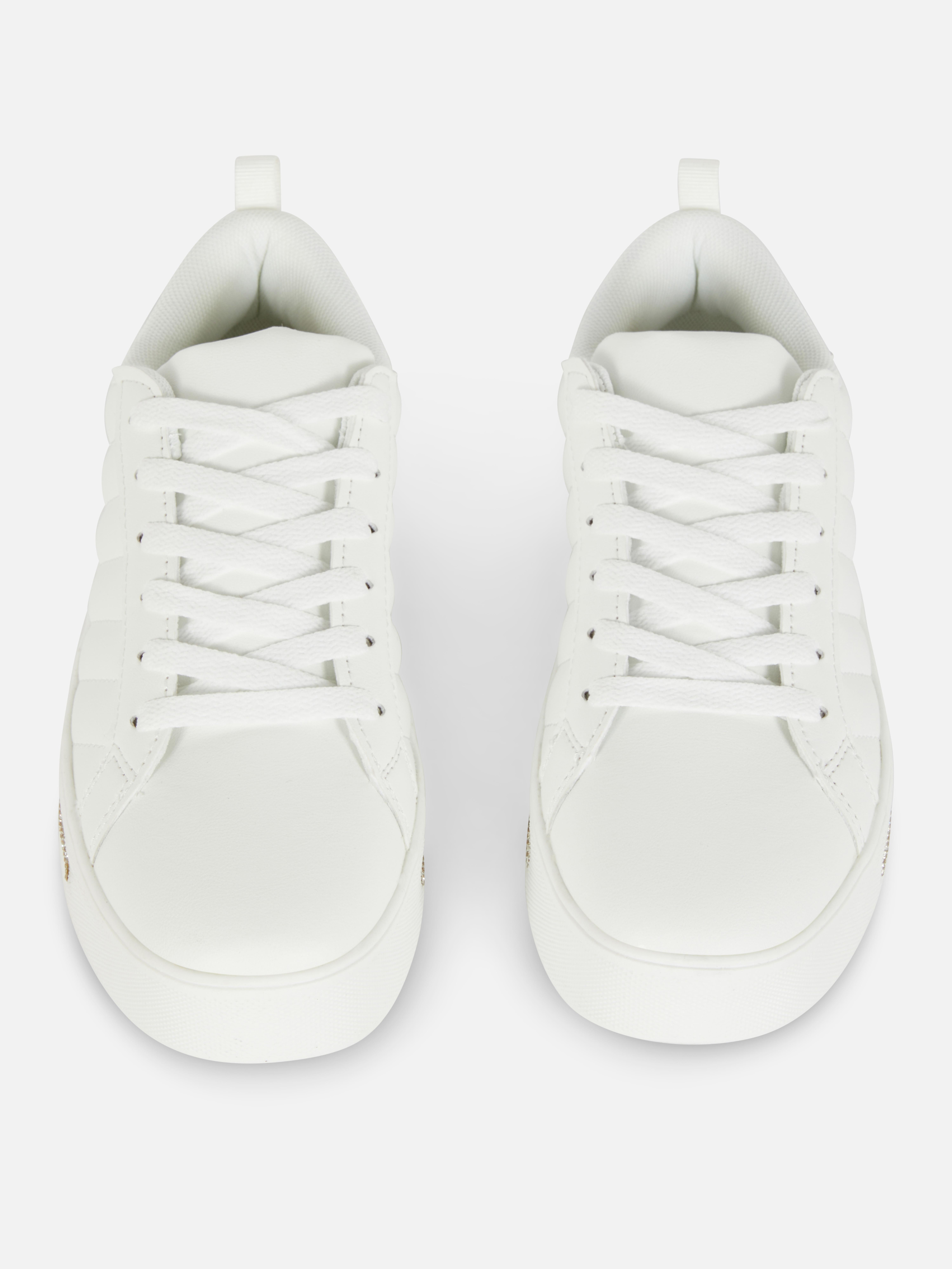 Low-top sneakers with rhinestones. Add some subtle sparkle to your shoes!