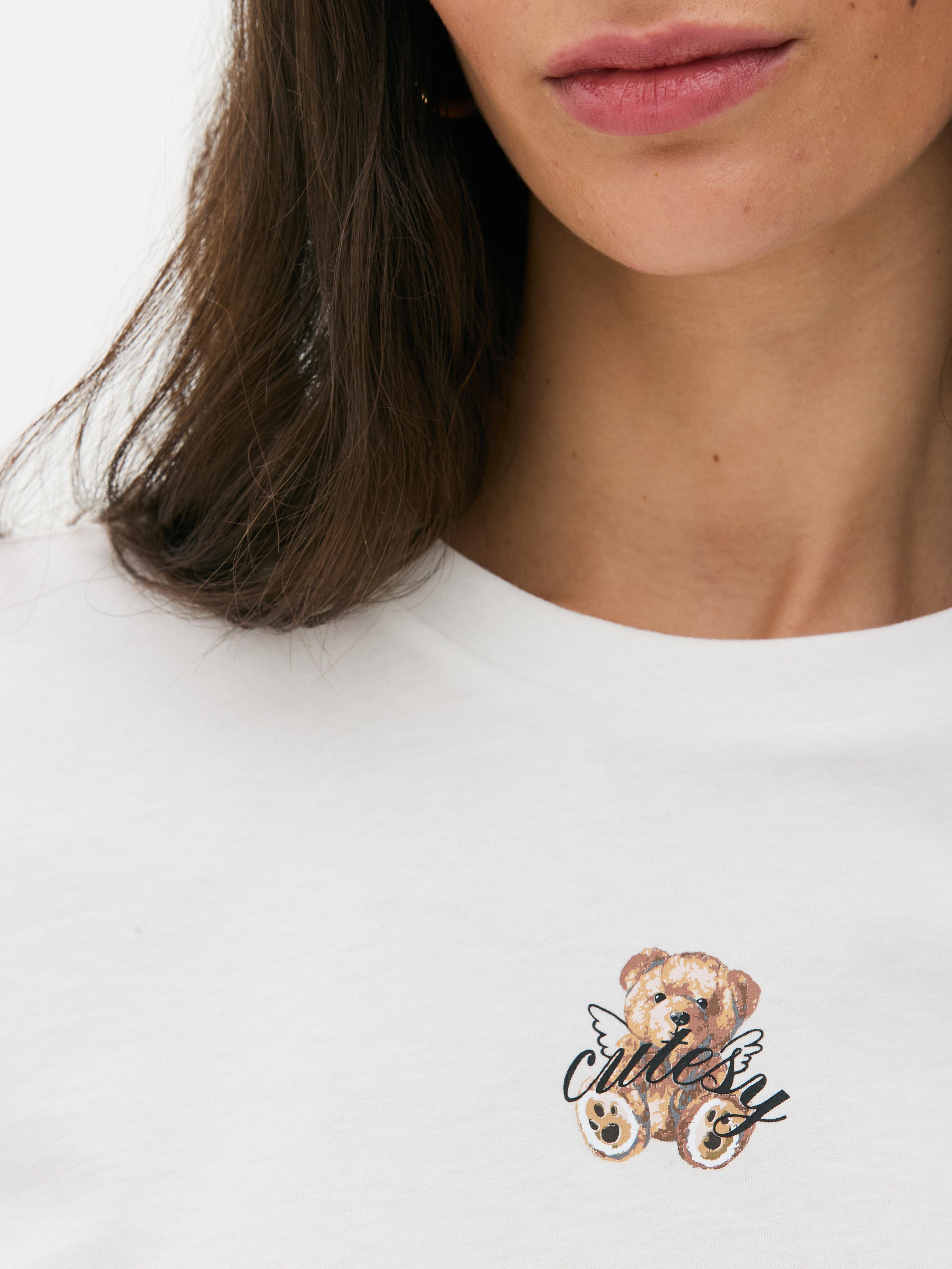 Tricou pentru bebeluși cu imprimeu cu ursuleți de pluș Un tricou pentru bebeluși cu mâneci scurte și imprimeu cu ursuleți de pluș pe față