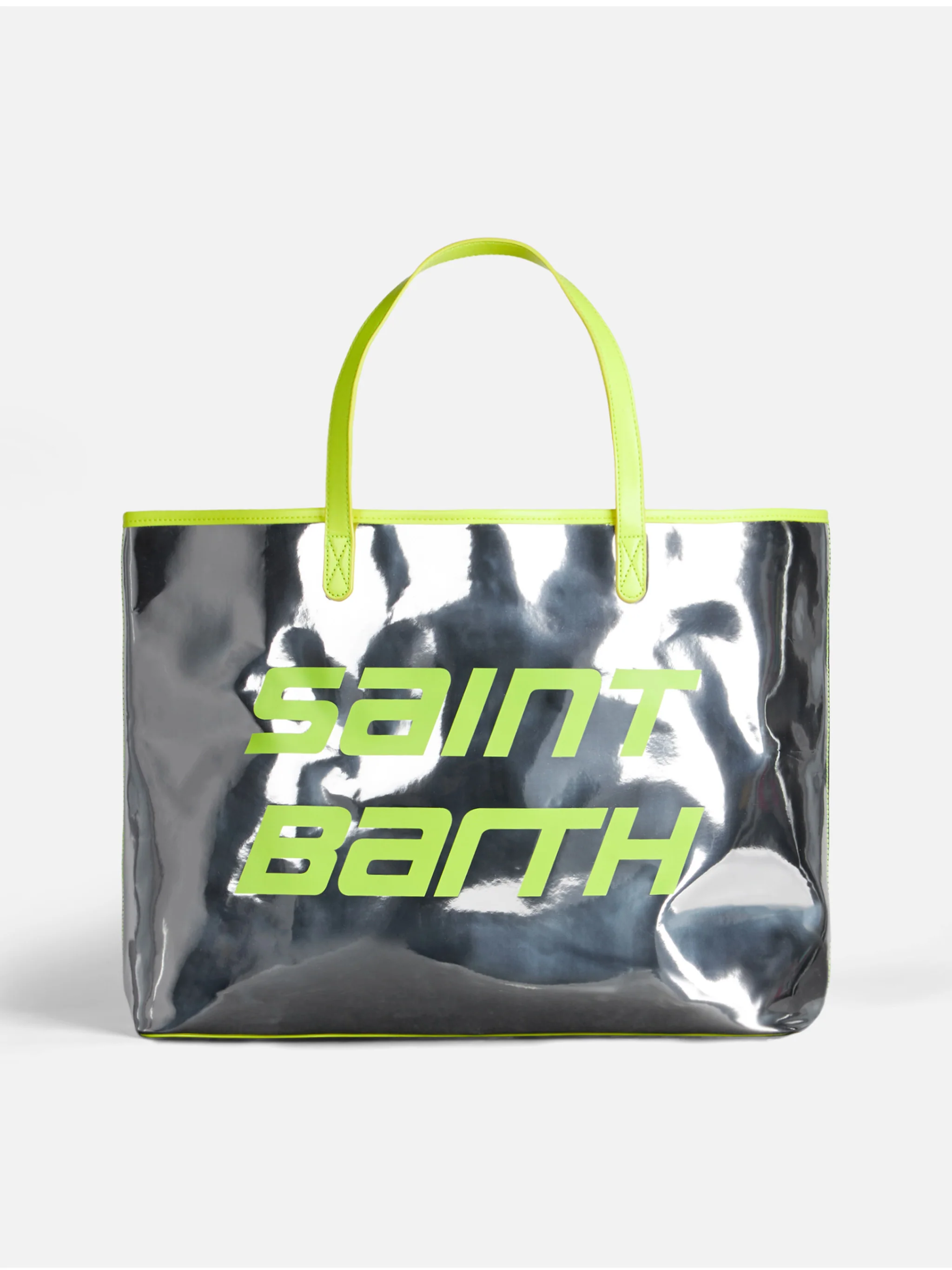 Zilverkleurige reflecterende tas met fluorescerend gele details.