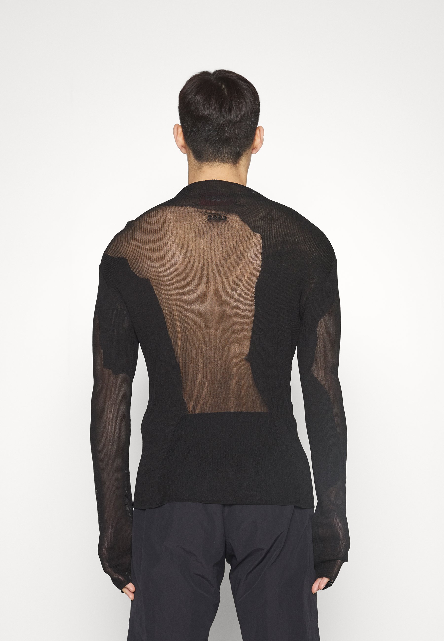Pull à col roulé transparent 032c - noir