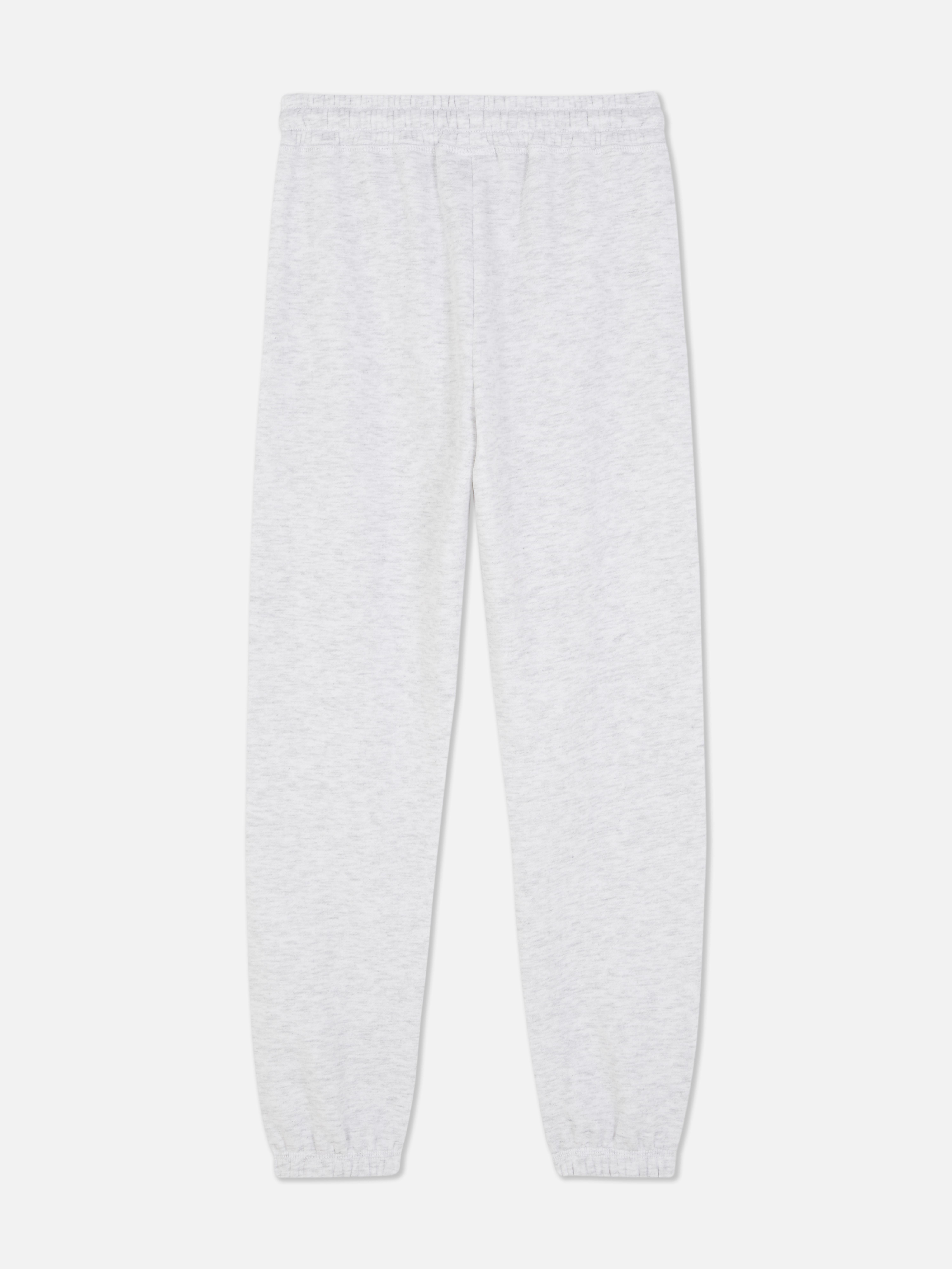 Pantaloni de trening cu șnur de fixare Disney's Stitch O pereche de pantaloni de trening cu șnur de fixare, manșete la gleznă și design Disney's Stitch