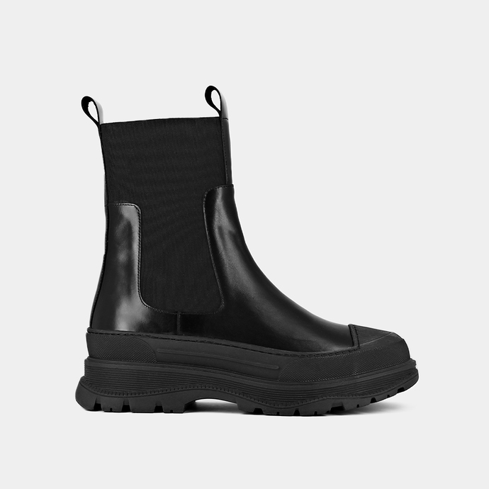 Boots à semelles crantées  en cuir glacé noir