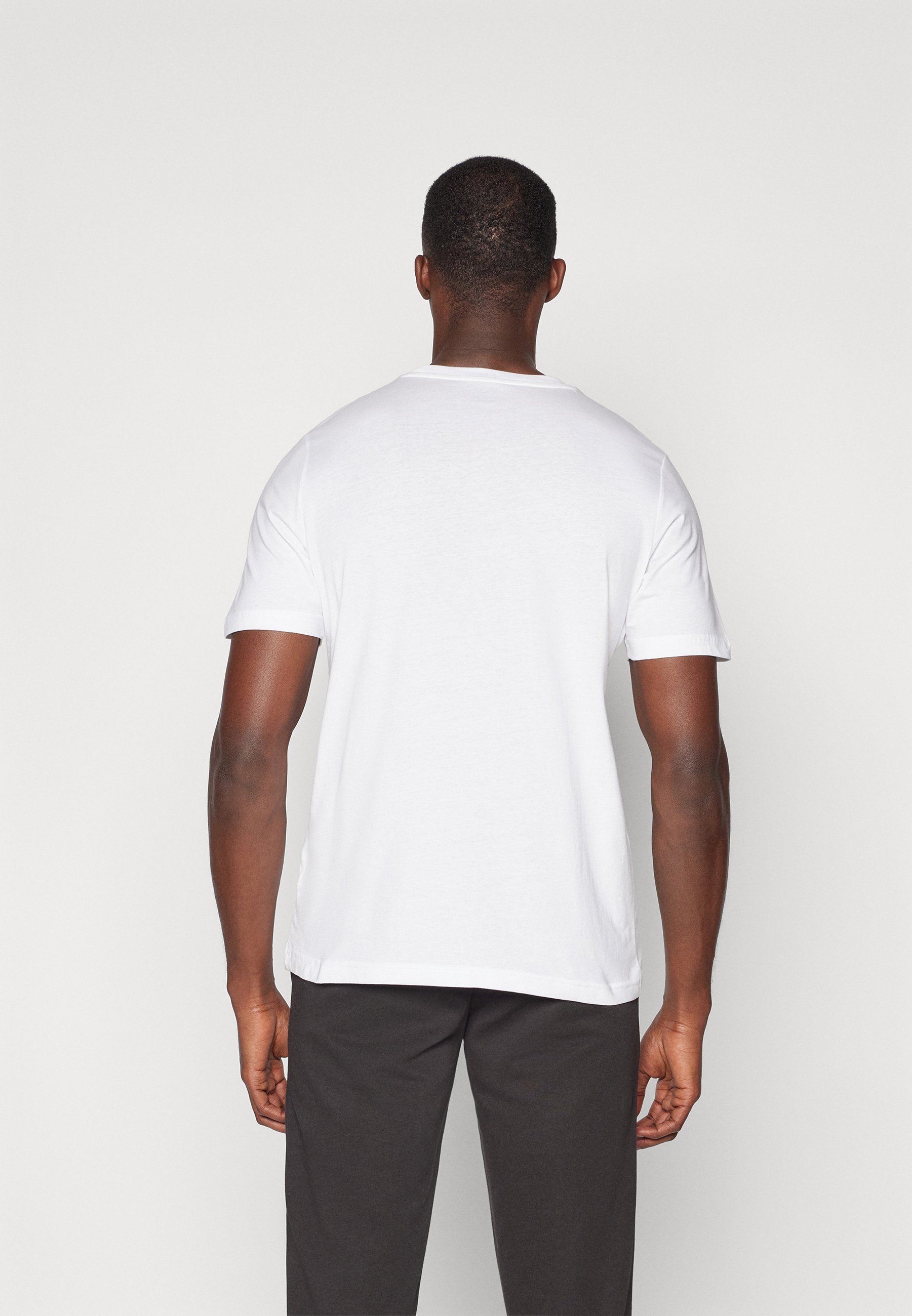 Puma LOGO T-shirt - T-shirt met print - wit