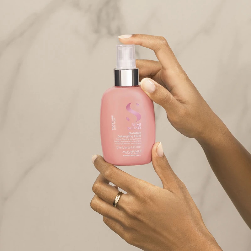 Alfaparf Milano Semi di Lino Moisture Nutritive Detangling Fluid, vlažilna nega brez izpiranja za enostavno razvozlavanje las
