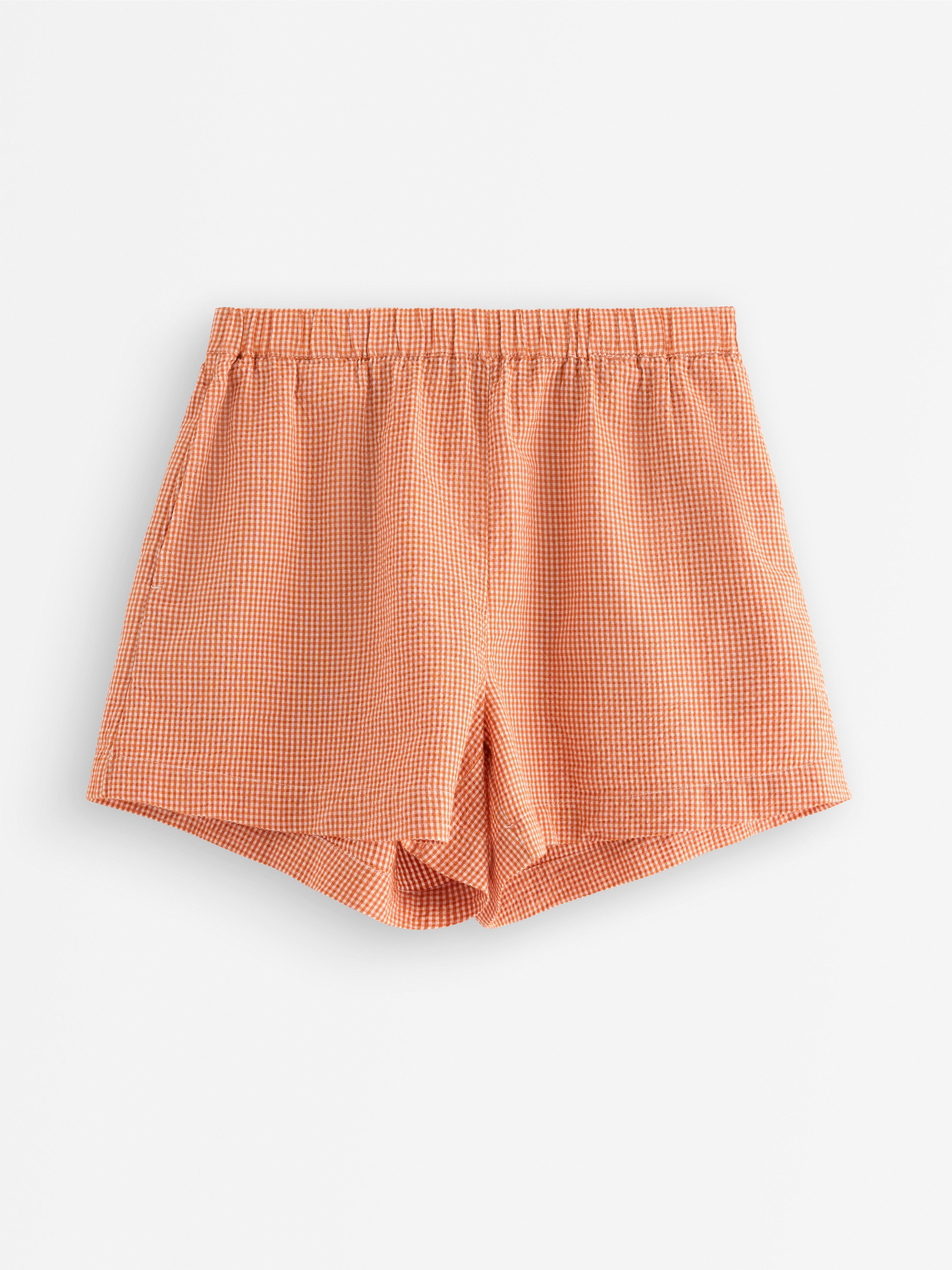 Pyžamové kraťasy Dusty Orange s vlnovkou potoka
