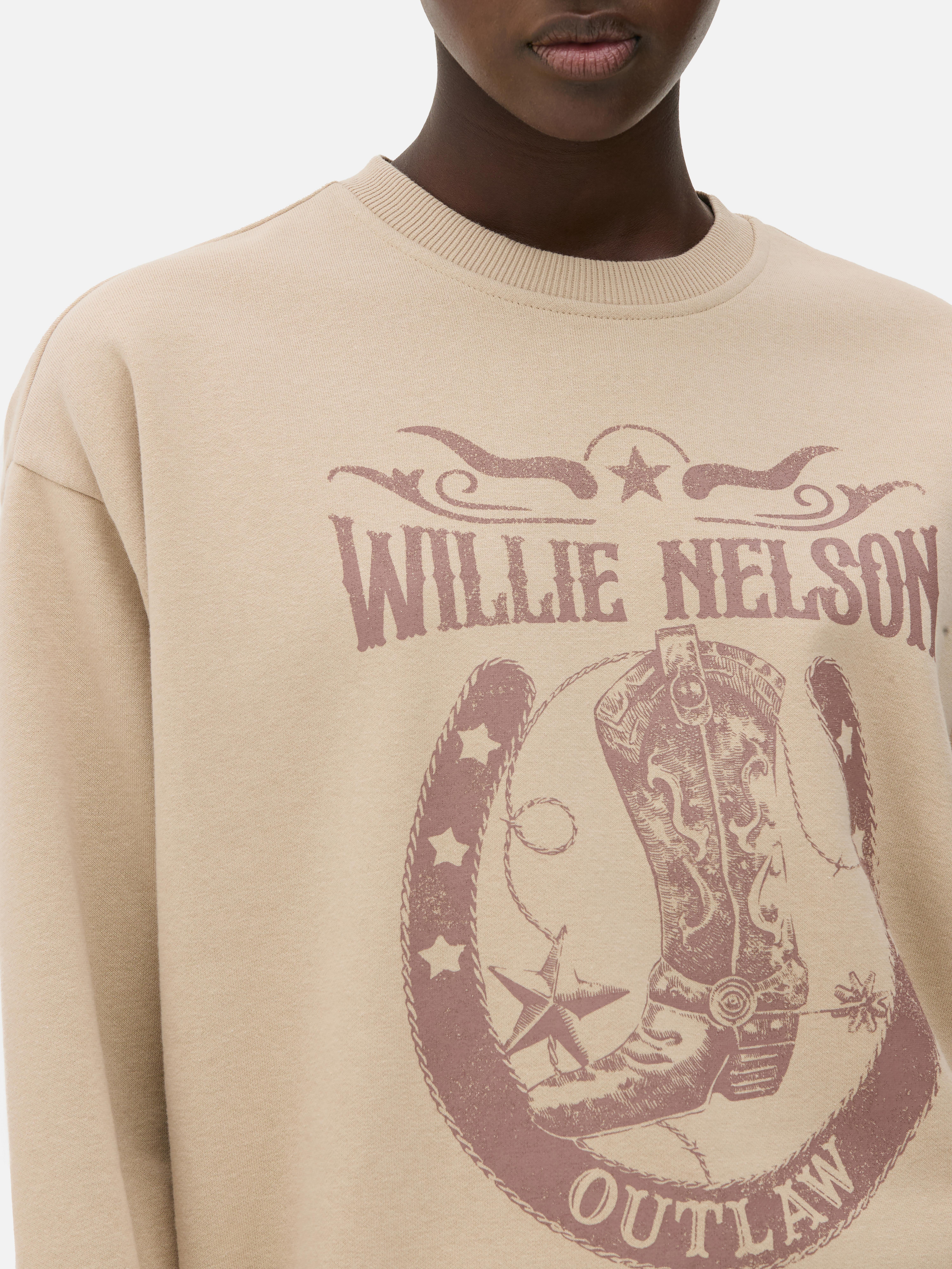 Hanorac Willie Nelson Un hanorac din jerseu cu guler rotund, mâneci lungi și imprimeu Willie Nelson pe față