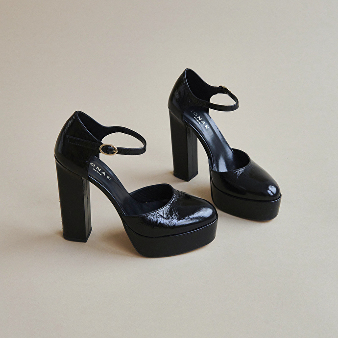 Salomés à talons et plateformes  en cuir brillant noir