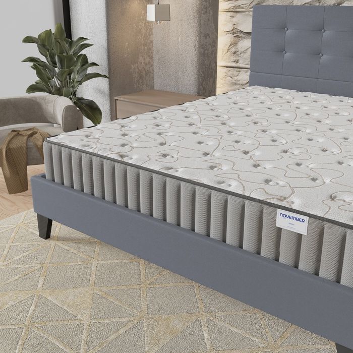 Colchón y cama (140x190cm) - Orionis de 16cm de espuma viscoelástica y espuma de alta densidad + base de láminas estable y cabecero tapizado en gris.