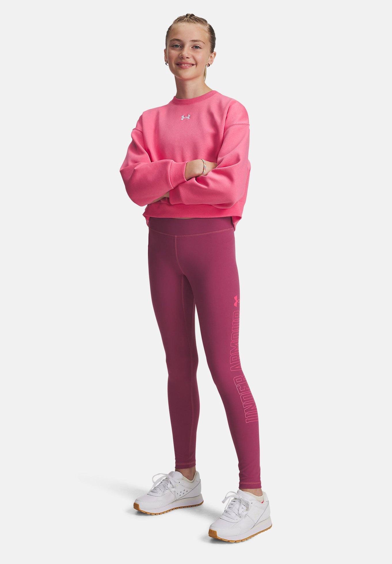Under Armour MOTION BRANDED - Leginsy - fuksja zmierzch