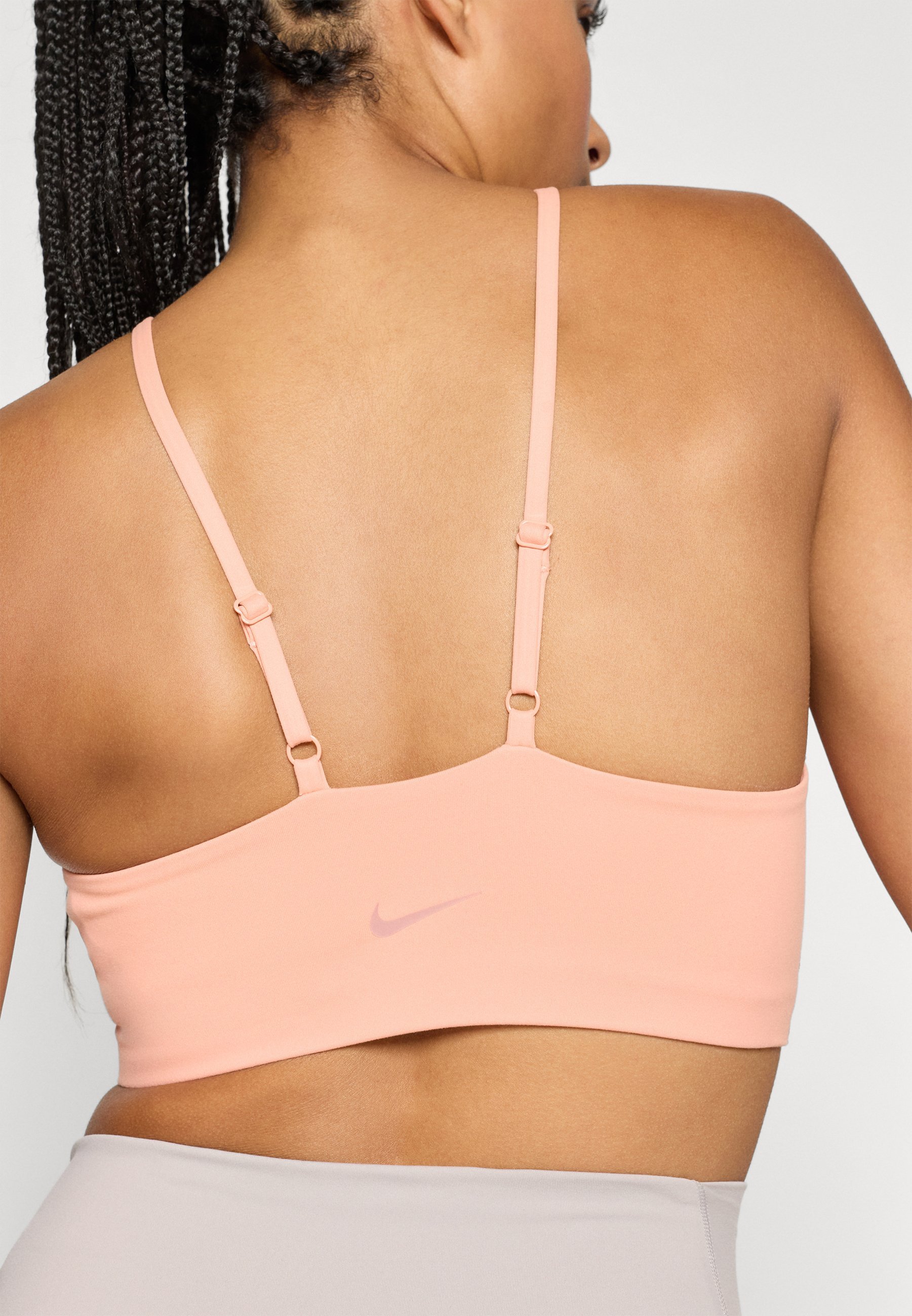 Nike Performance KEYHOLE BRA - Sportbeha met lichte ondersteuning - abrikoos agaat