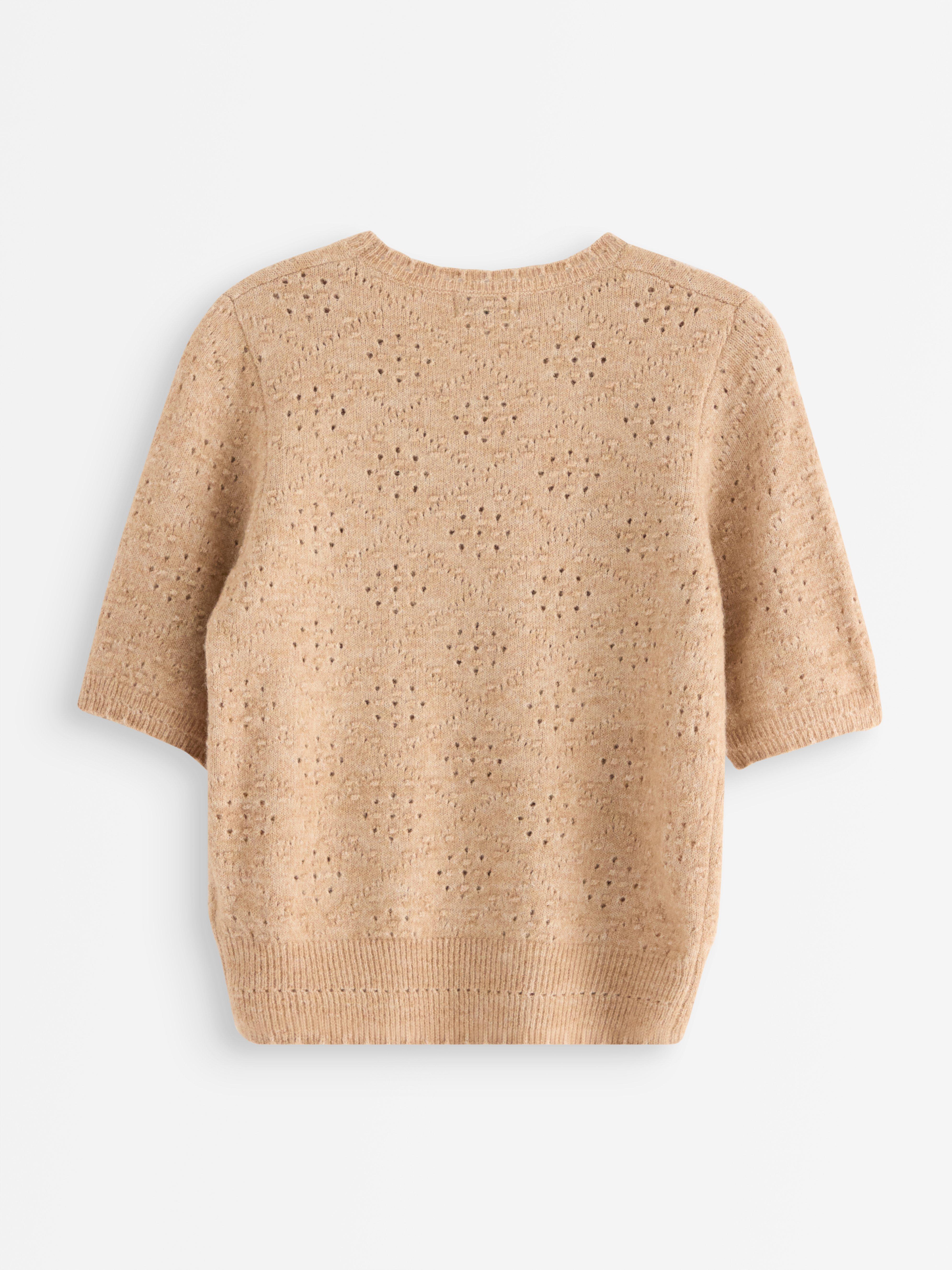 Jersey de punto color beige claro jaspeado