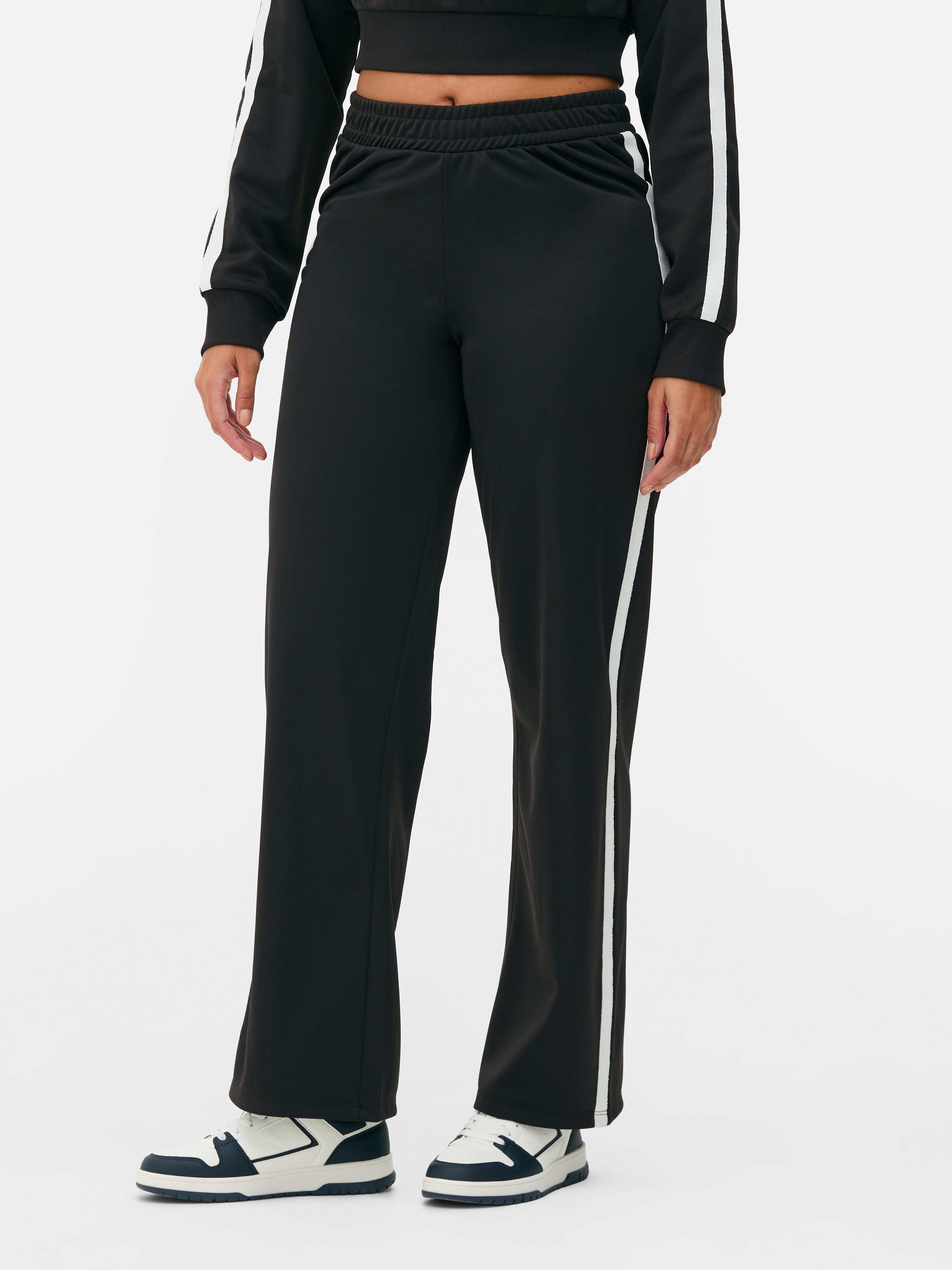 Pantaloni de trening asortați cu bandă laterală Pantaloni de trening drepți cu talie elastică lată și bandă laterală