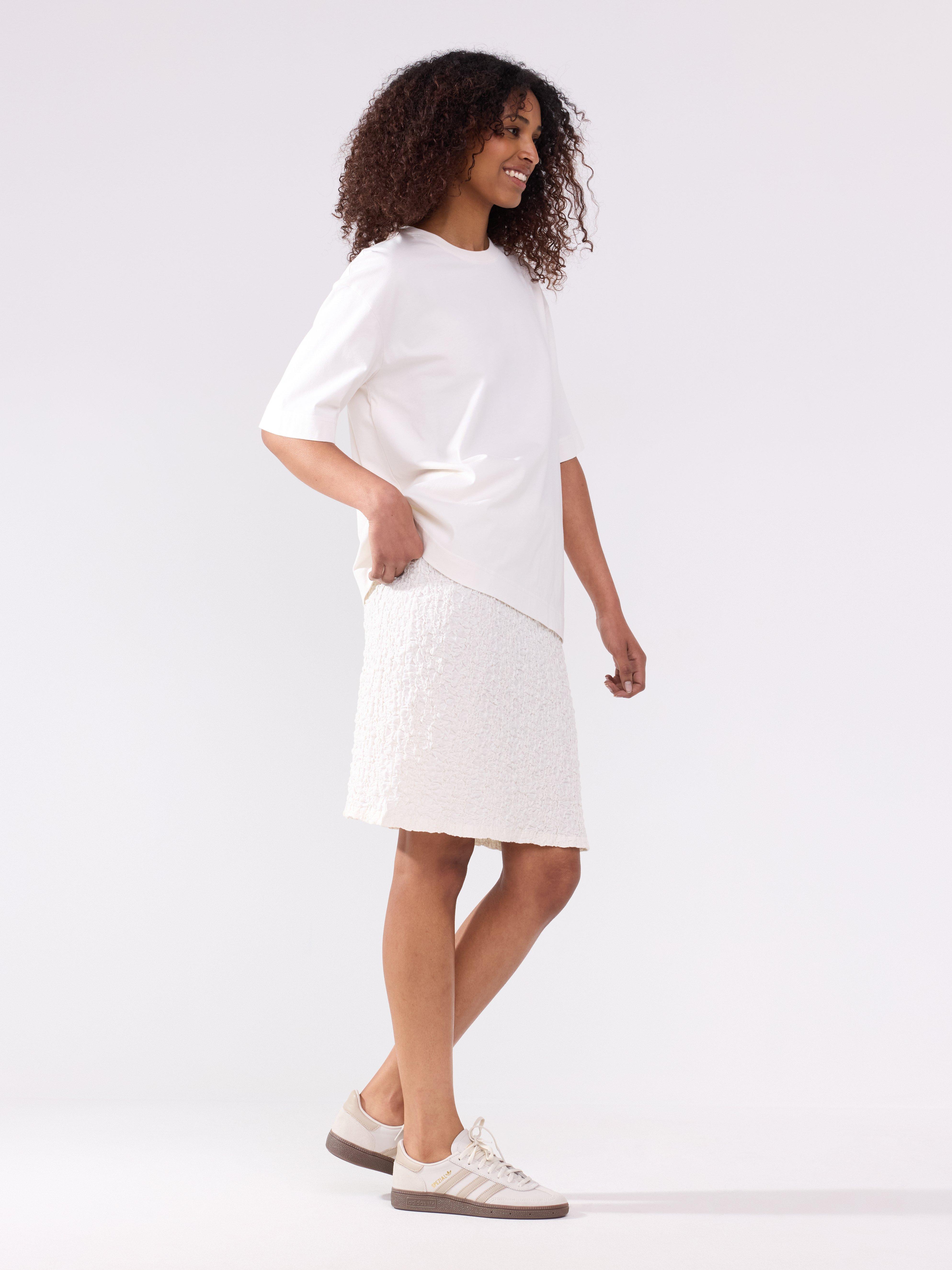 Minifalda texturizada color blanco roto