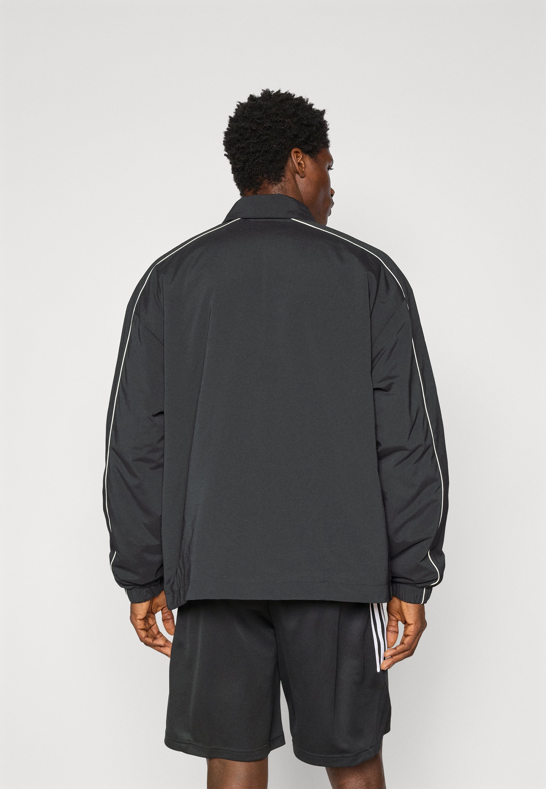 Giacca adidas Originals COACH - Giacca da esterno - nero/avorio
