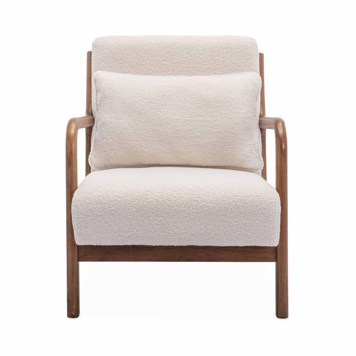 Sillón tapizado con tejido de bucle. Patas de madera de caucho teñidas en nogal claro. Asiento fijo y recto. Patas de estilo escandinavo. Estructura de madera maciza.