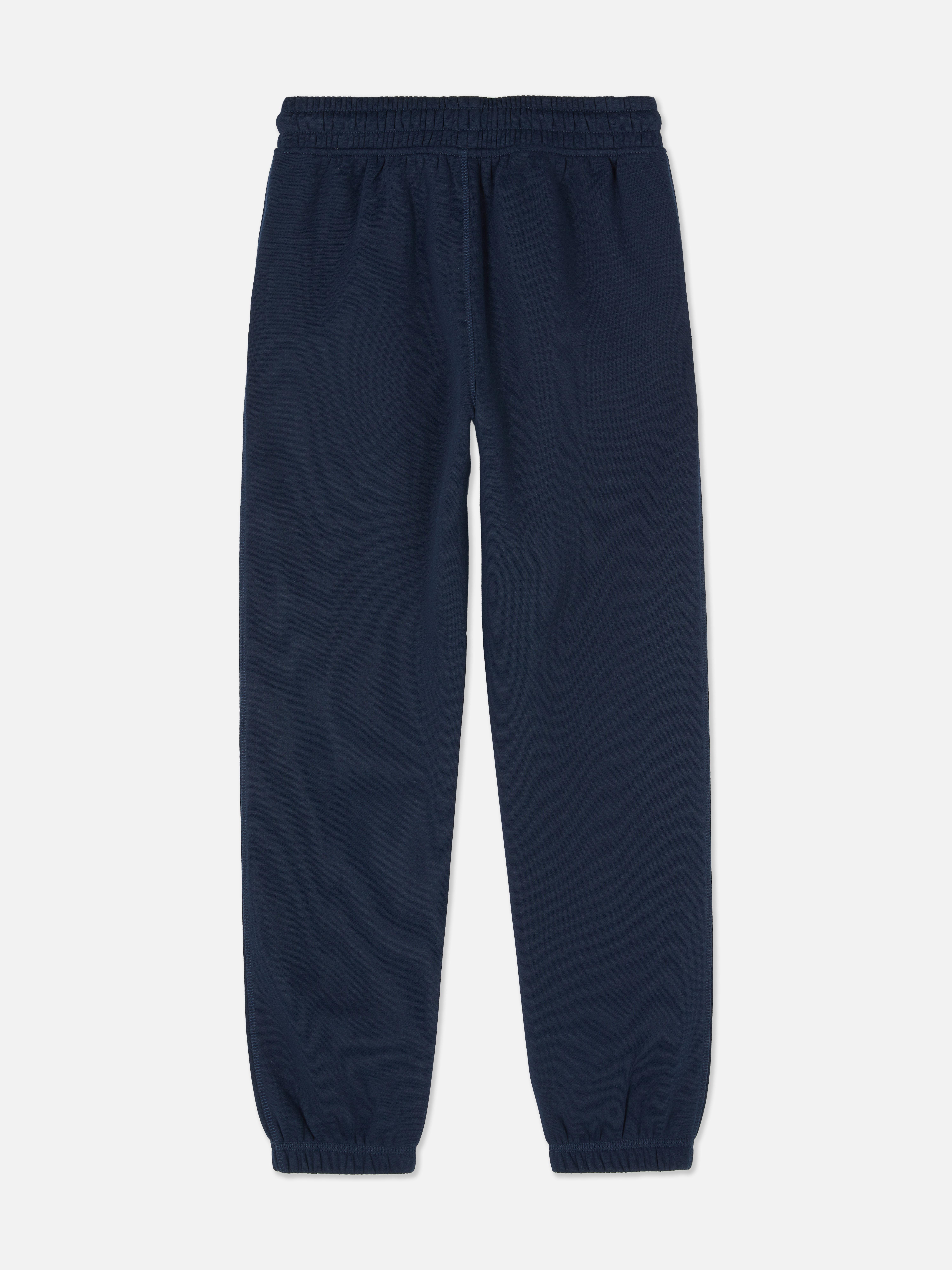 Jogginghose für Jungen mit Bund und Kordelzug. Lässige und bequeme Jogginghose mit Kordelzug im Bund, Seitentaschen und Bündchen.