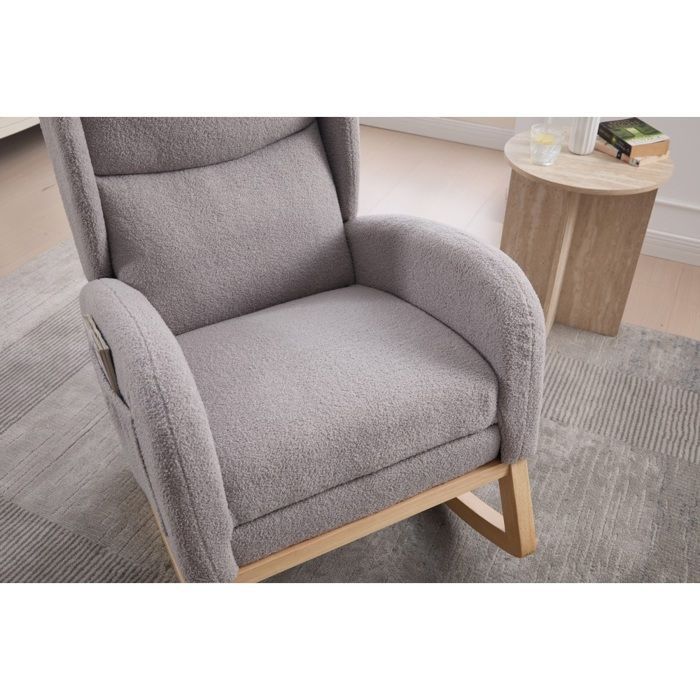 Fauteuil d'allaitement gris à bascule, dossier haut et repose-pieds réglable avec poche. Confortable pour salon et chambre.