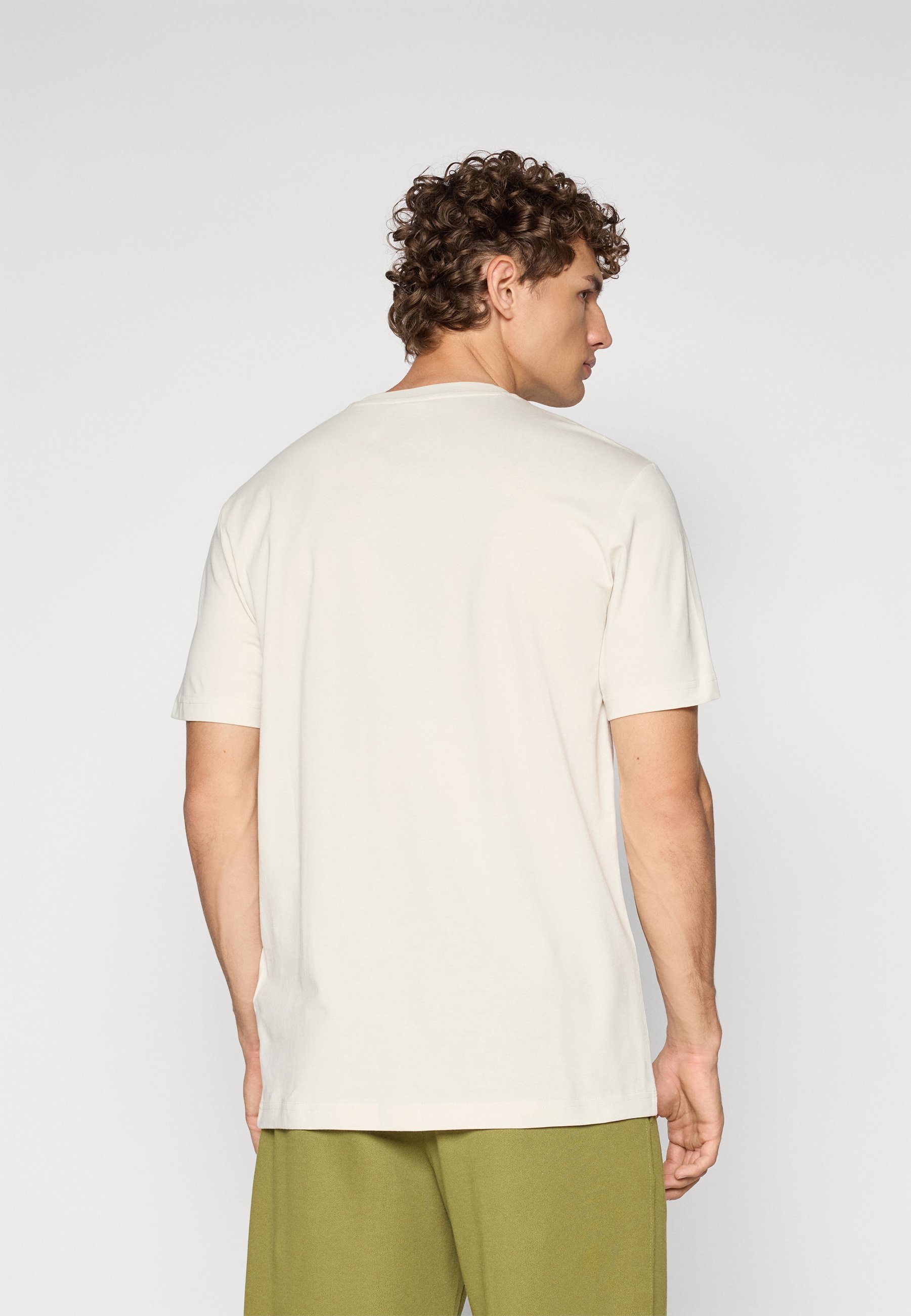 Champion ICONS TONAL CREWNECK MET GROOT LOGO - T-shirt met print - beige