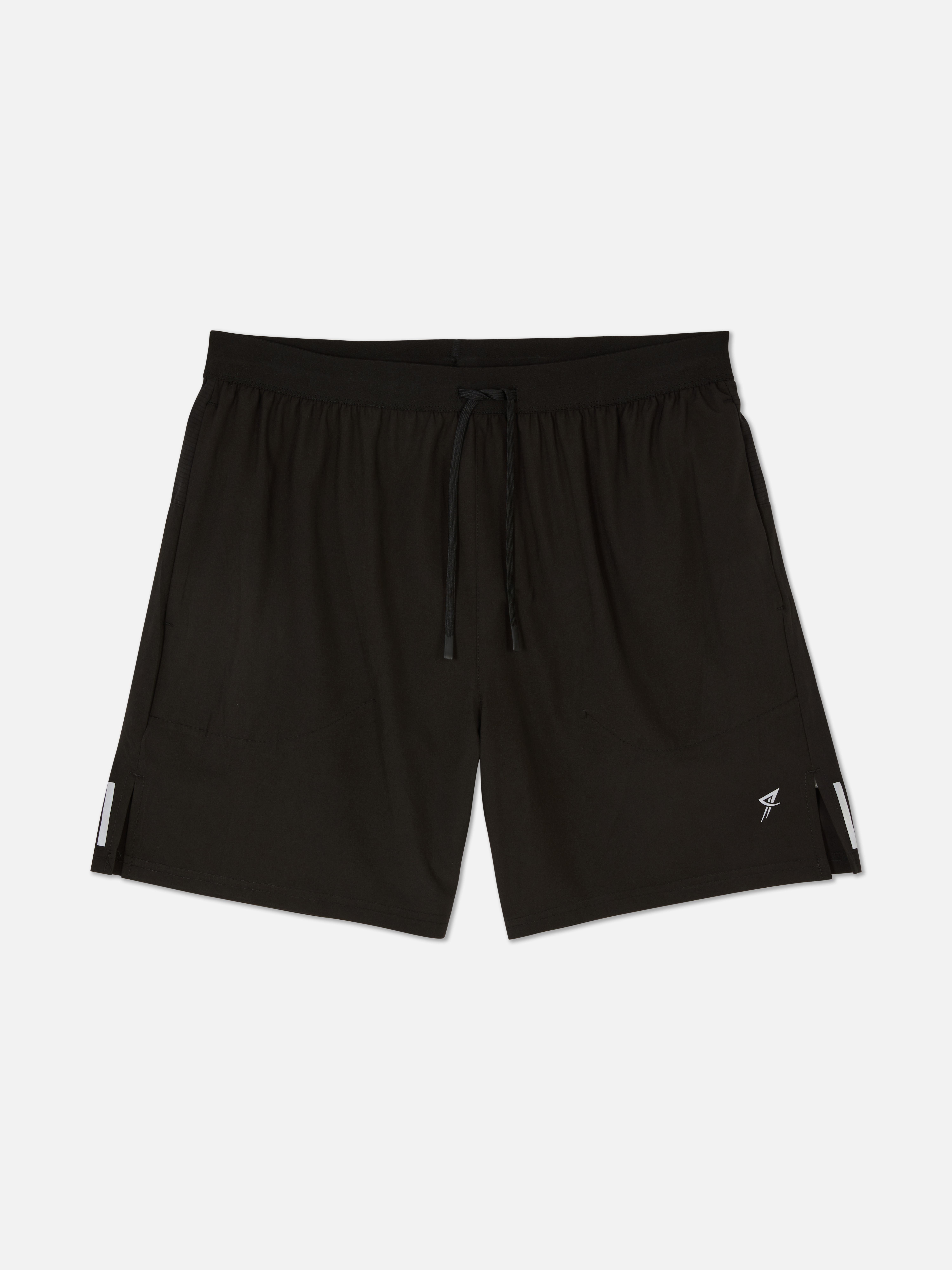 Pantaloni scurți de alergare cu șnur. Pantaloni scurți sport cu talie cu șnur și buzunare laterale.