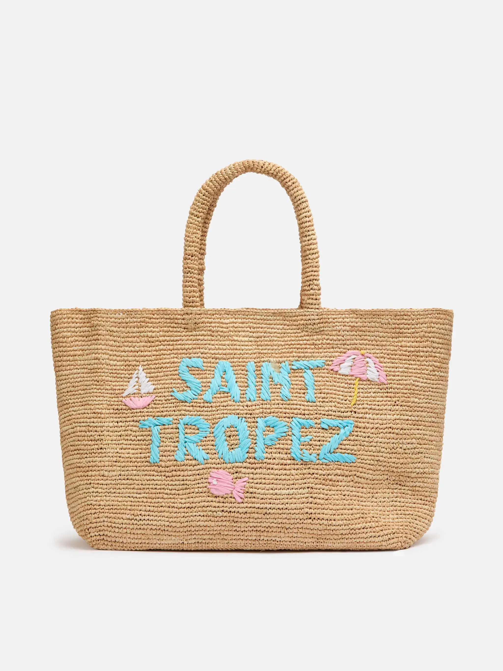 Beige raffia strandtas met katoenen binnenvak en St. Trop-borduurwerk.