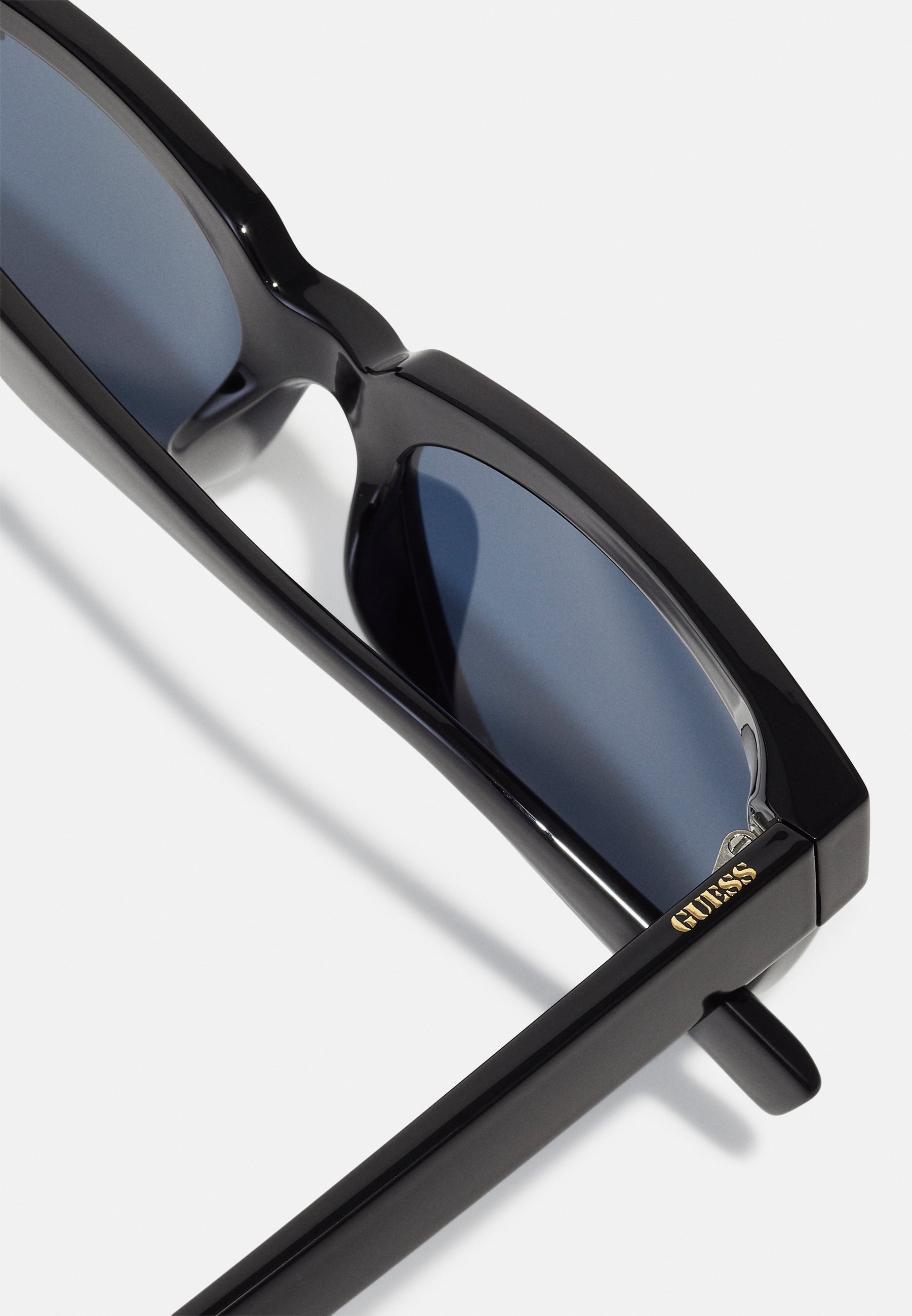 Lunettes de soleil Guess UNISEX - noir brillant