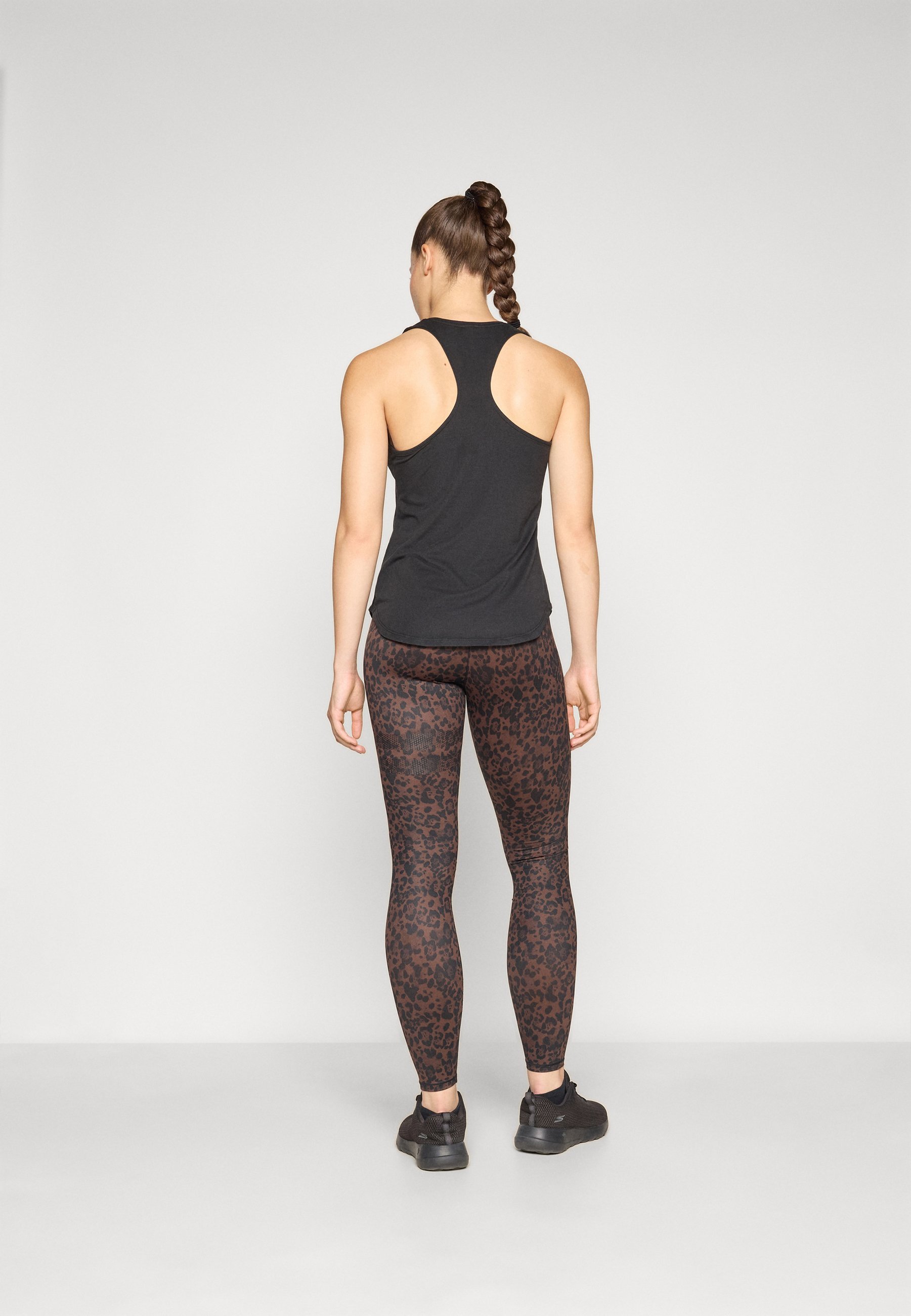 Stärkere Leggings mit Print – braun/mehrfarbig