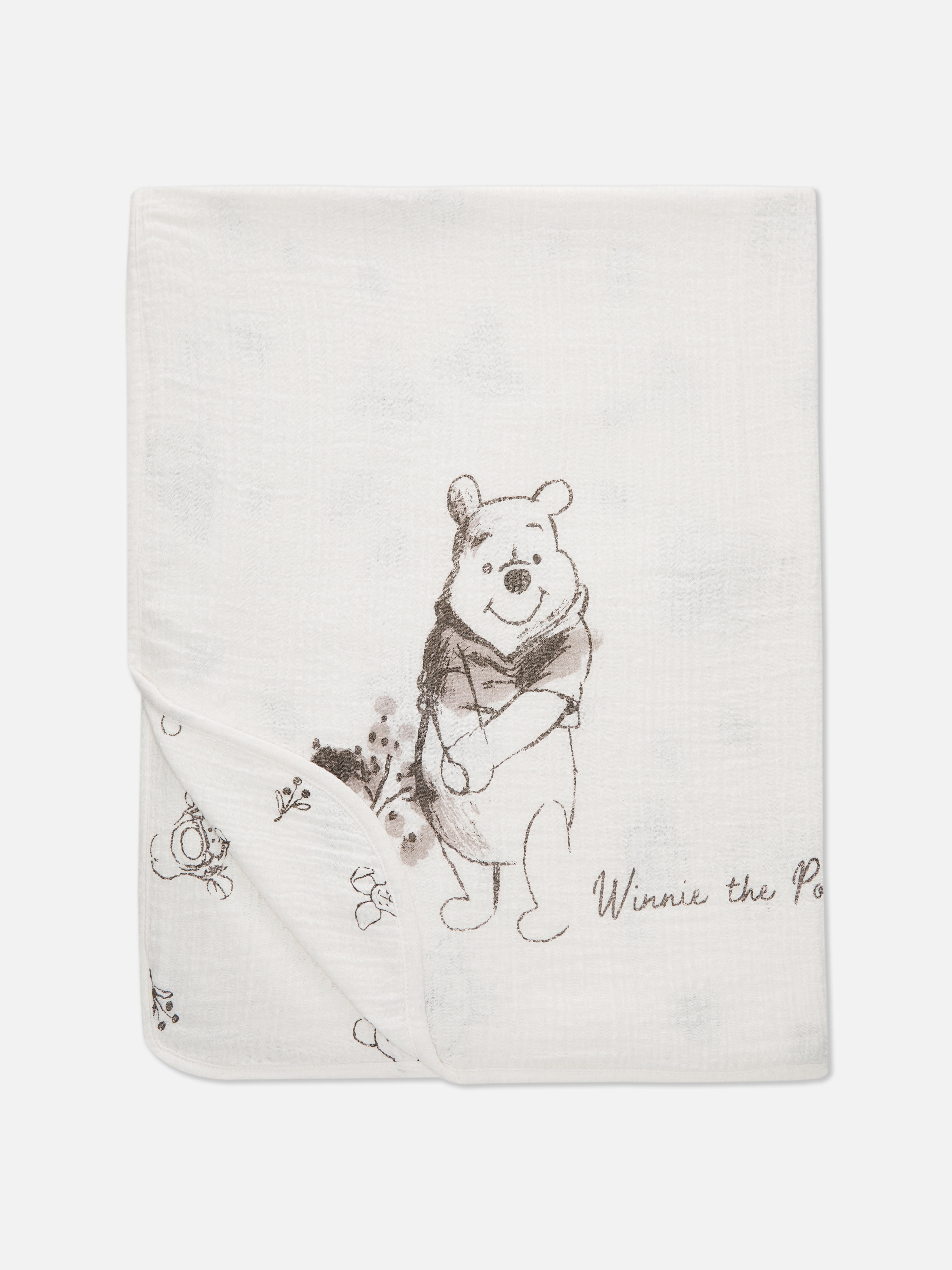 Disneys Winnie Puuh Babydecke – Eine bezaubernde Babydecke mit Illustrationen aus dem Hundertmorgenwald.