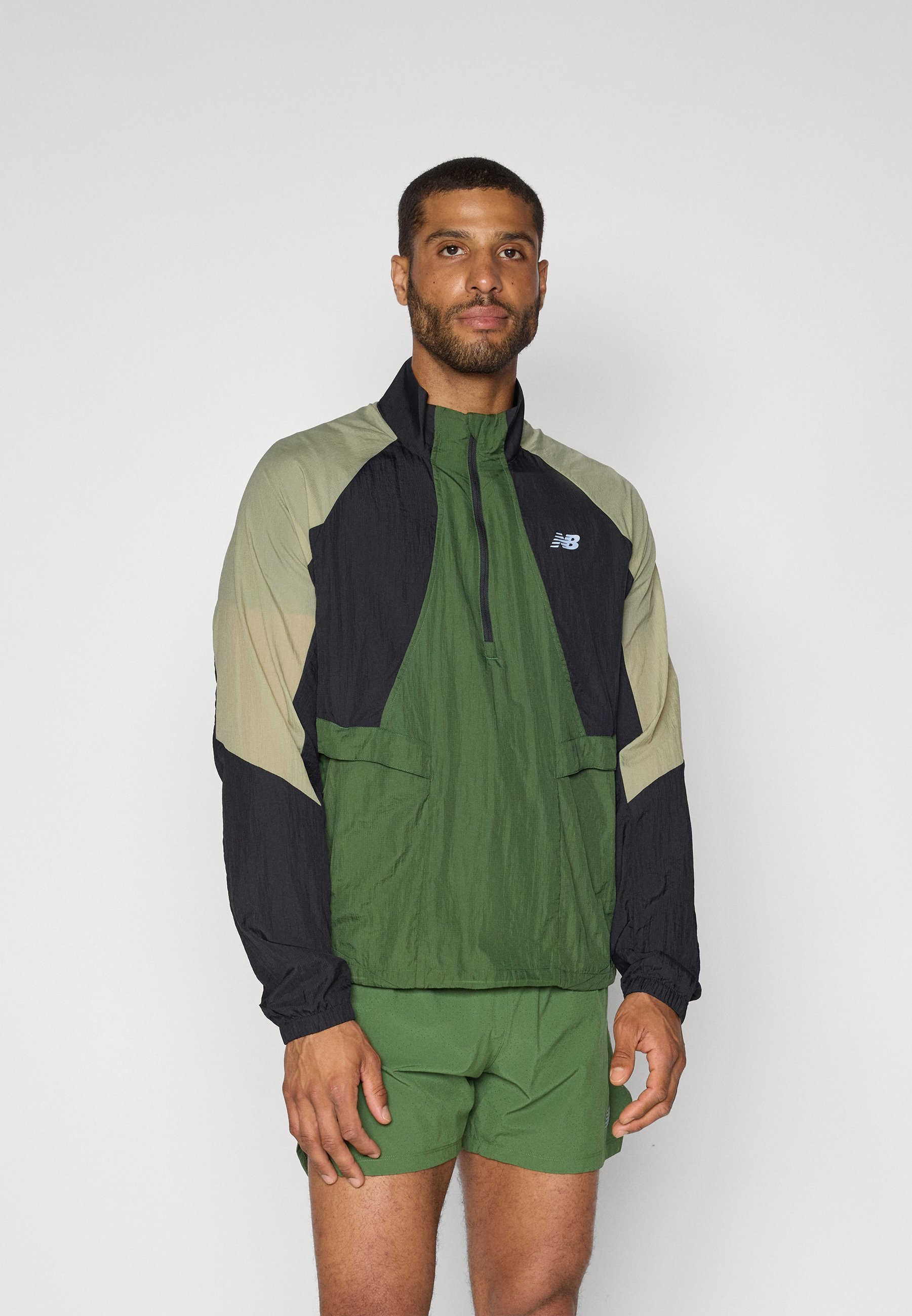 Giacca New Balance BETTER RUN RESISTENTE ALL'ACQUA - Antivento - giarrettiera