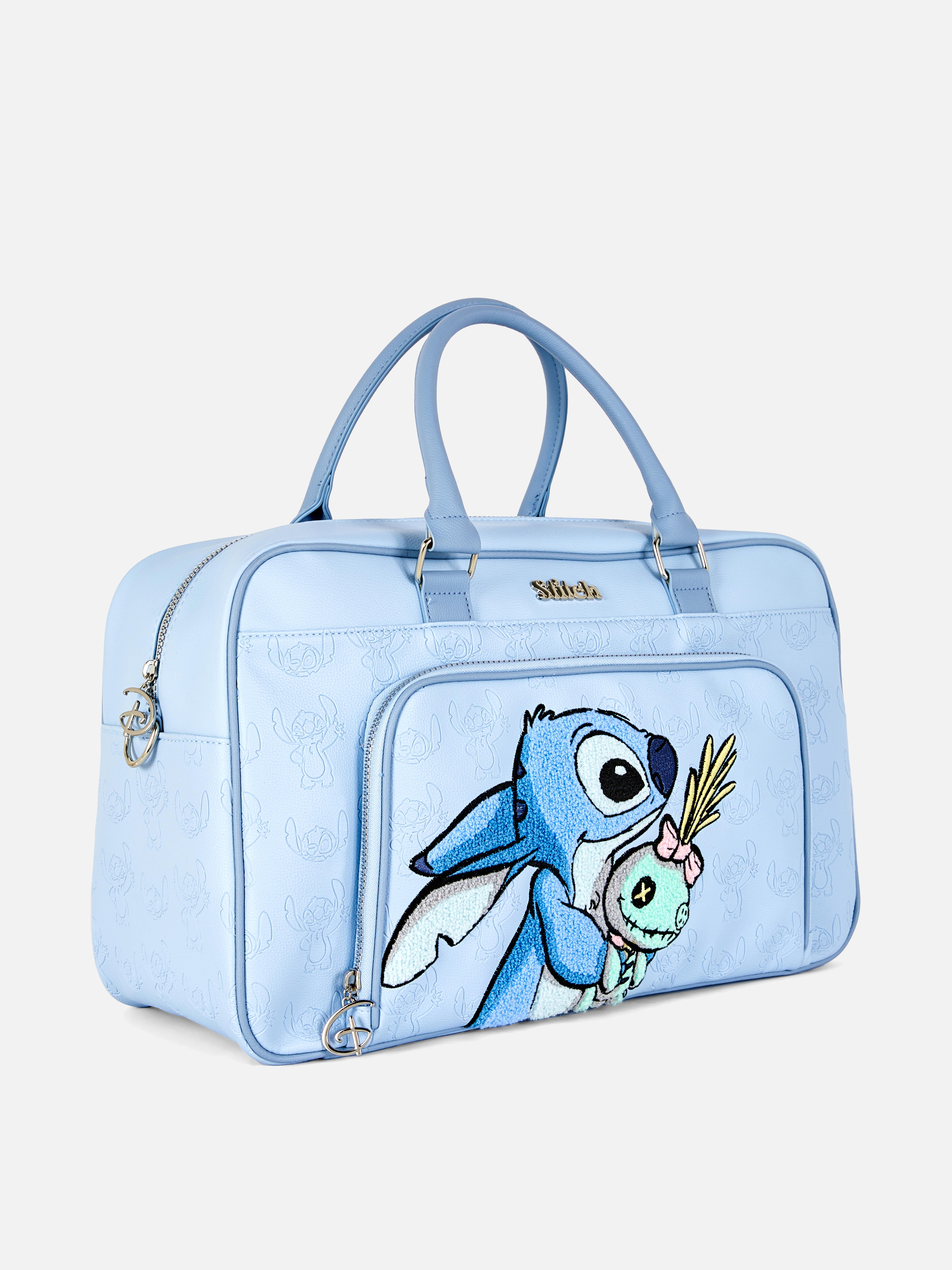 Disney Stitch Wochenendtasche: Eine Disney Wochenendtasche mit Stitch- und Scrump-Motiv, geräumigem Innenfach und Außentasche mit Reißverschluss.
