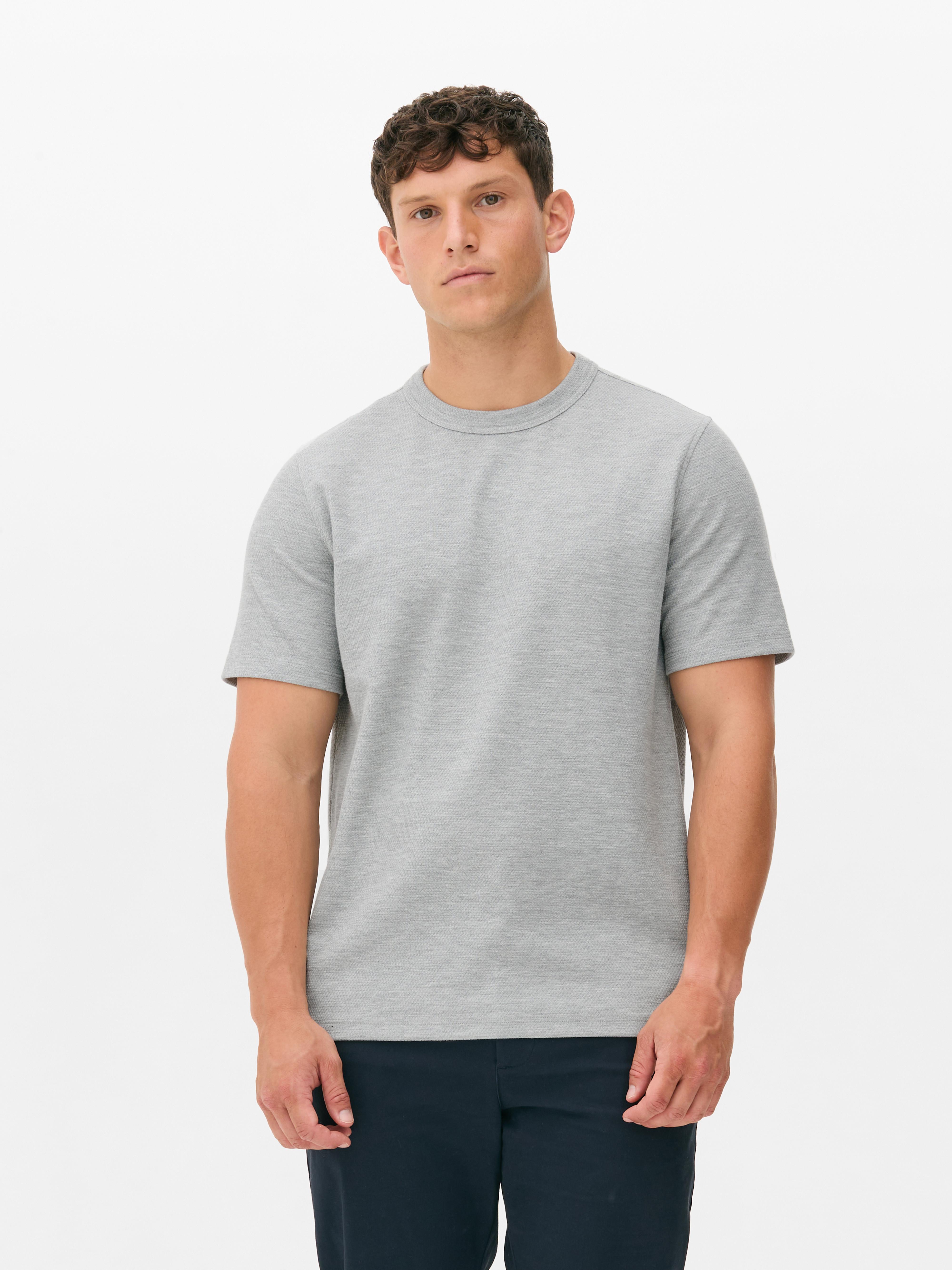 T-shirt met honingraattextuur Een T-shirt met een ronde hals, korte mouwen en honingraatstructuur