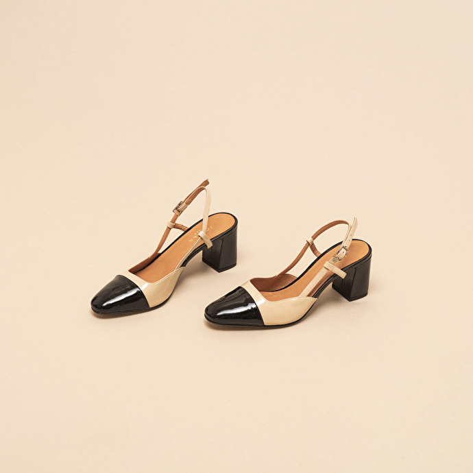 Babies à talons  en cuir vernis noir et beige