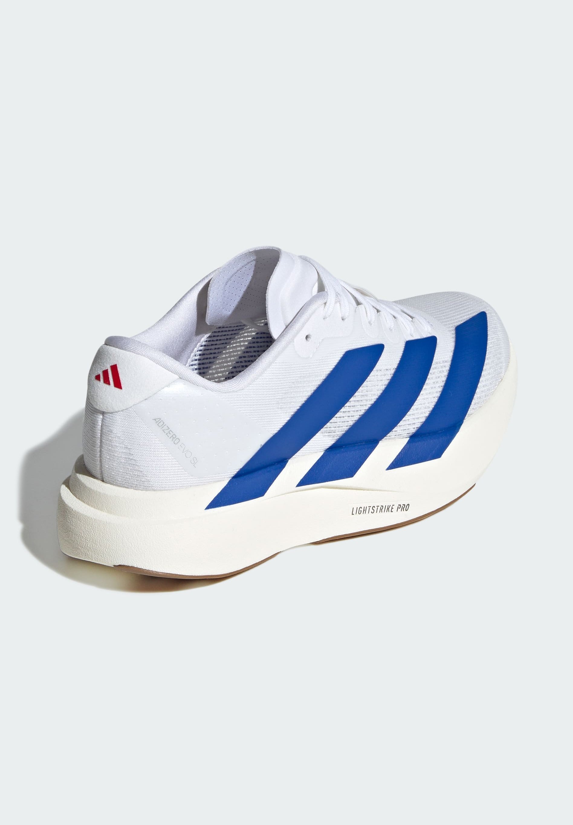 adidas Performance EVO SL ADIZERO UNISEX - Straßenlaufschuhe - ftwr weiß/team royalblau/pures Rubinrot