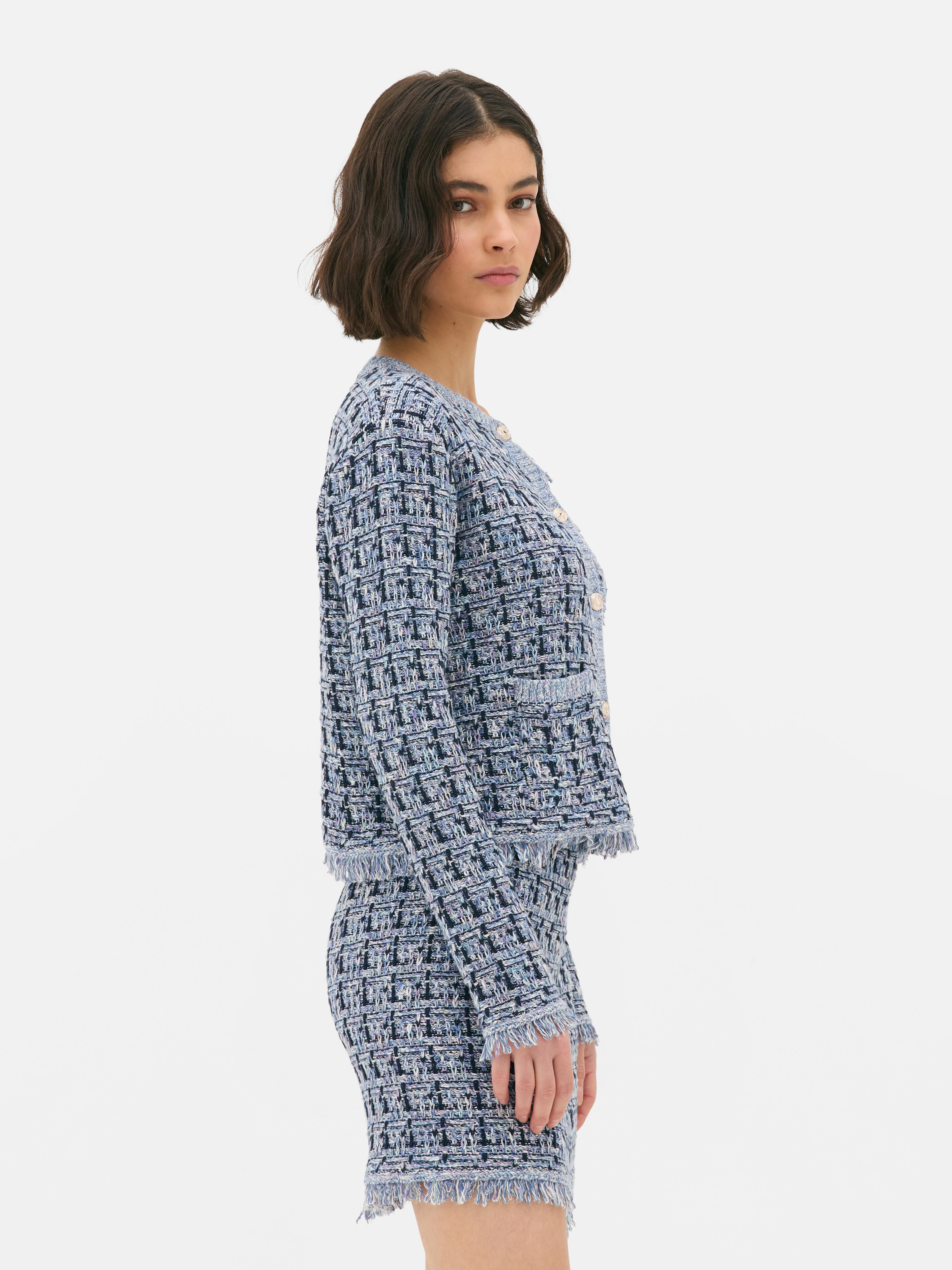Skinnende tweed-cardigan Hold det elegant med denne trendy tweed-cardiganen