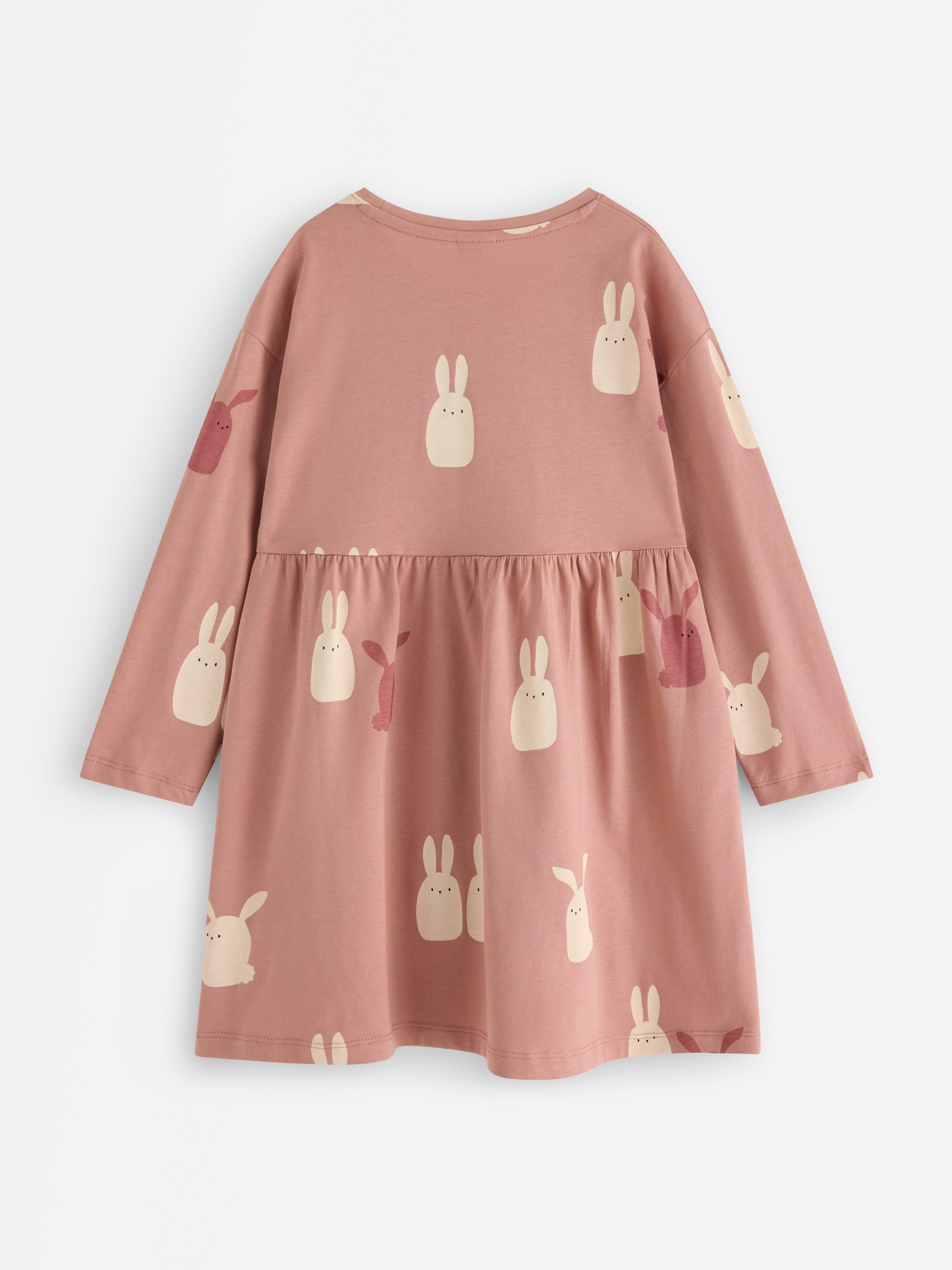 Vestido de manga larga color rosa empolvado