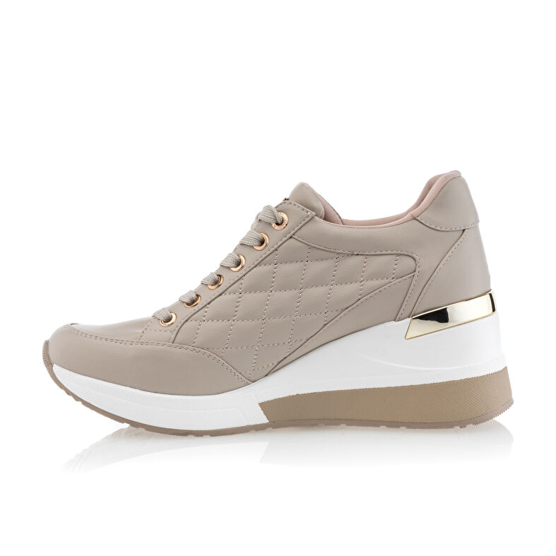 Zapatillas deportivas para mujer color beige.