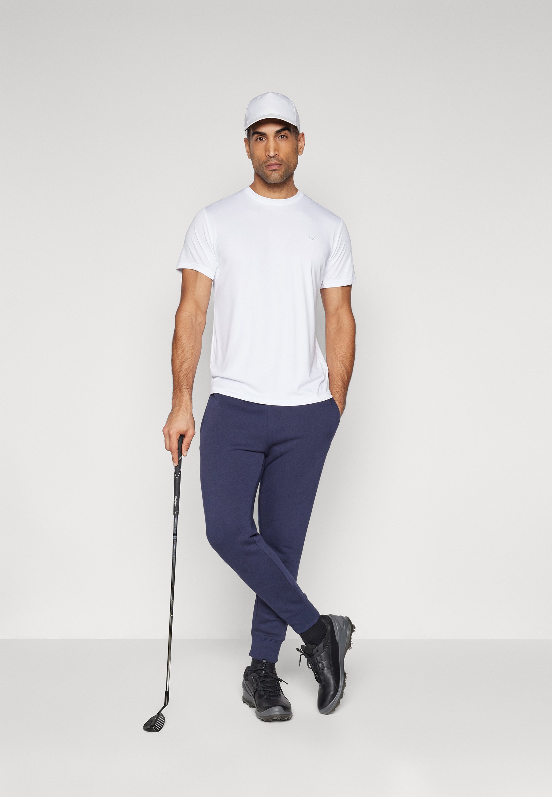 Calvin Klein Golf PLANET JOGGER - Pantaloni de trening - bleumarin