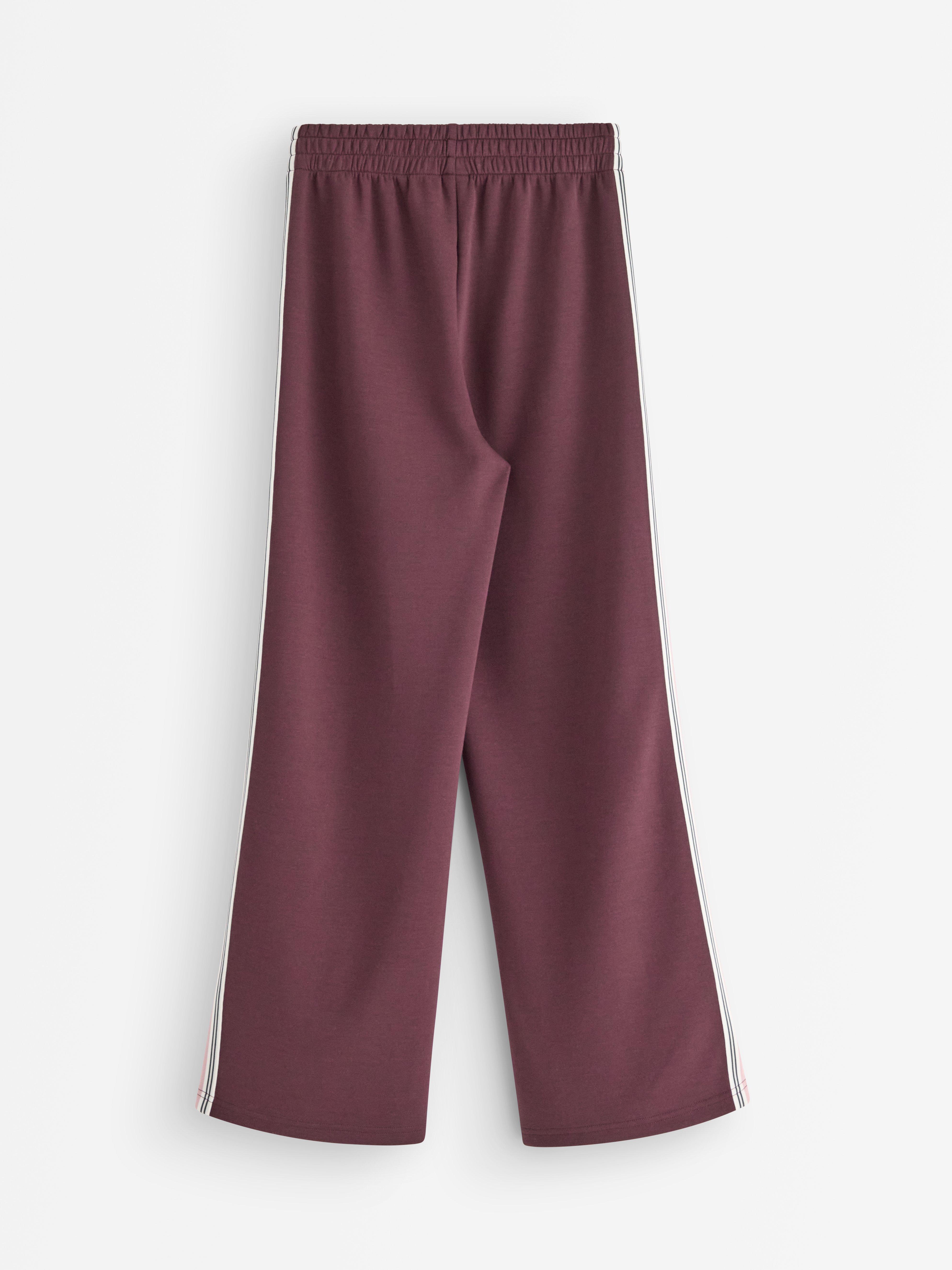 Pantaloni tricotați liliac închis