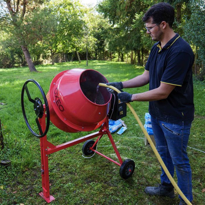 Betoniera da 160 litri - 650 W - 29,5 giri/min - Ingranaggi in ghisa - Volantino grande con blocco a pedale - Per calcestruzzo, malta, cemento