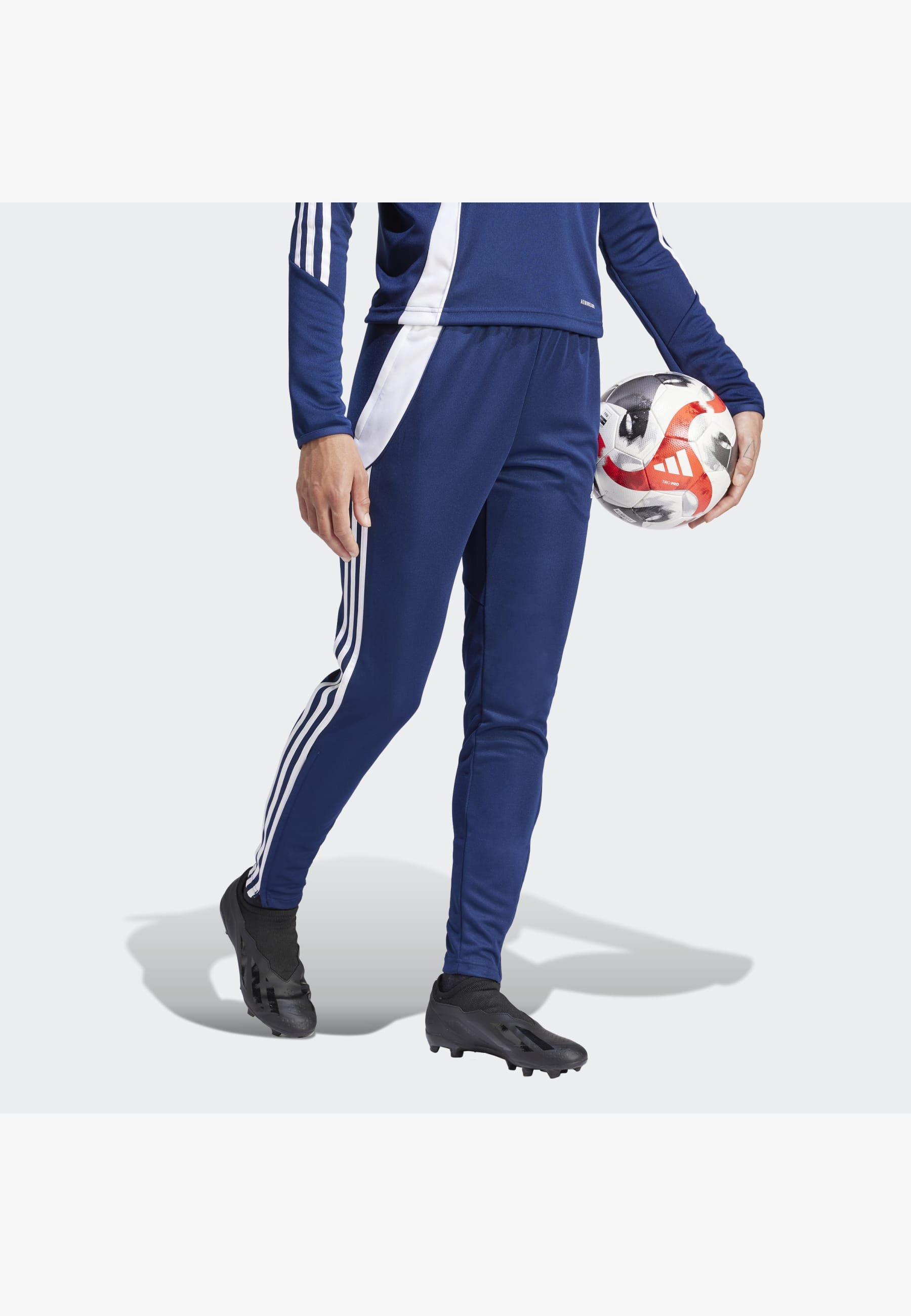 adidas Performance TIRO24 WOMEN - Tracksuit bottoms - team navy blue /white