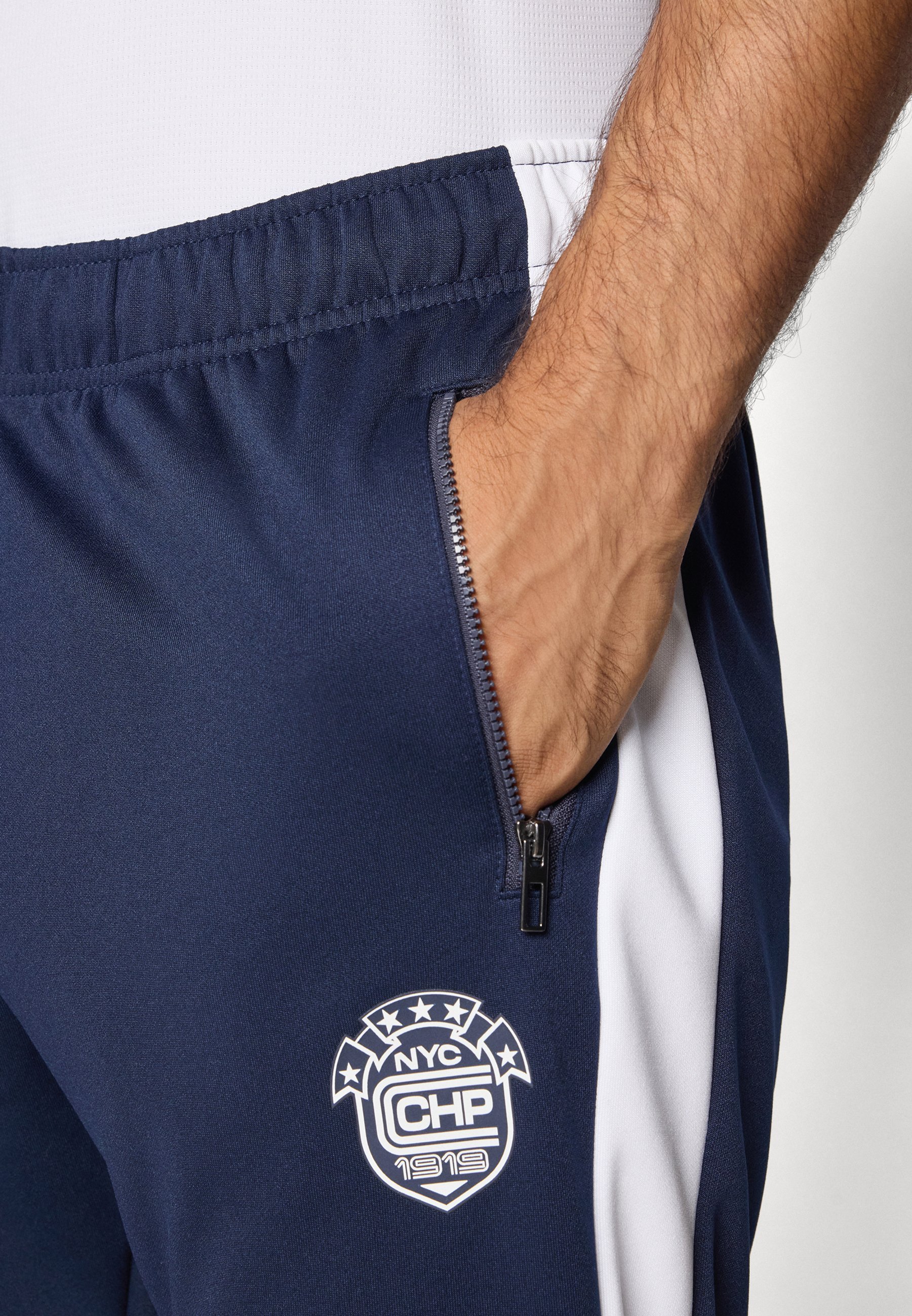 Champion SPORT HERITAGE ELASTIC CUFF PANTS INTERLOCK - Trainingsbroek - donkerblauw
