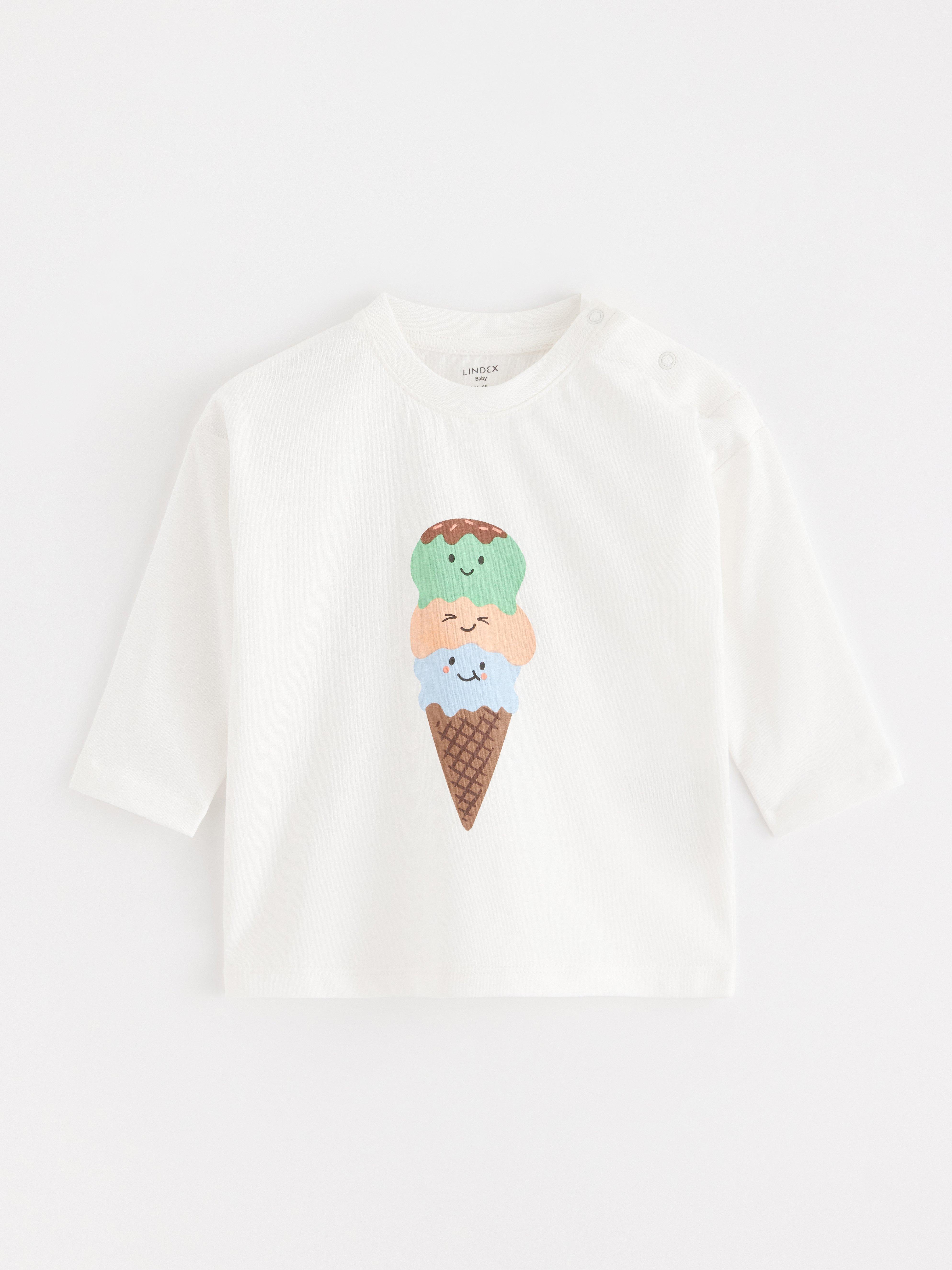 Top de manga larga color blanco claro empolvado