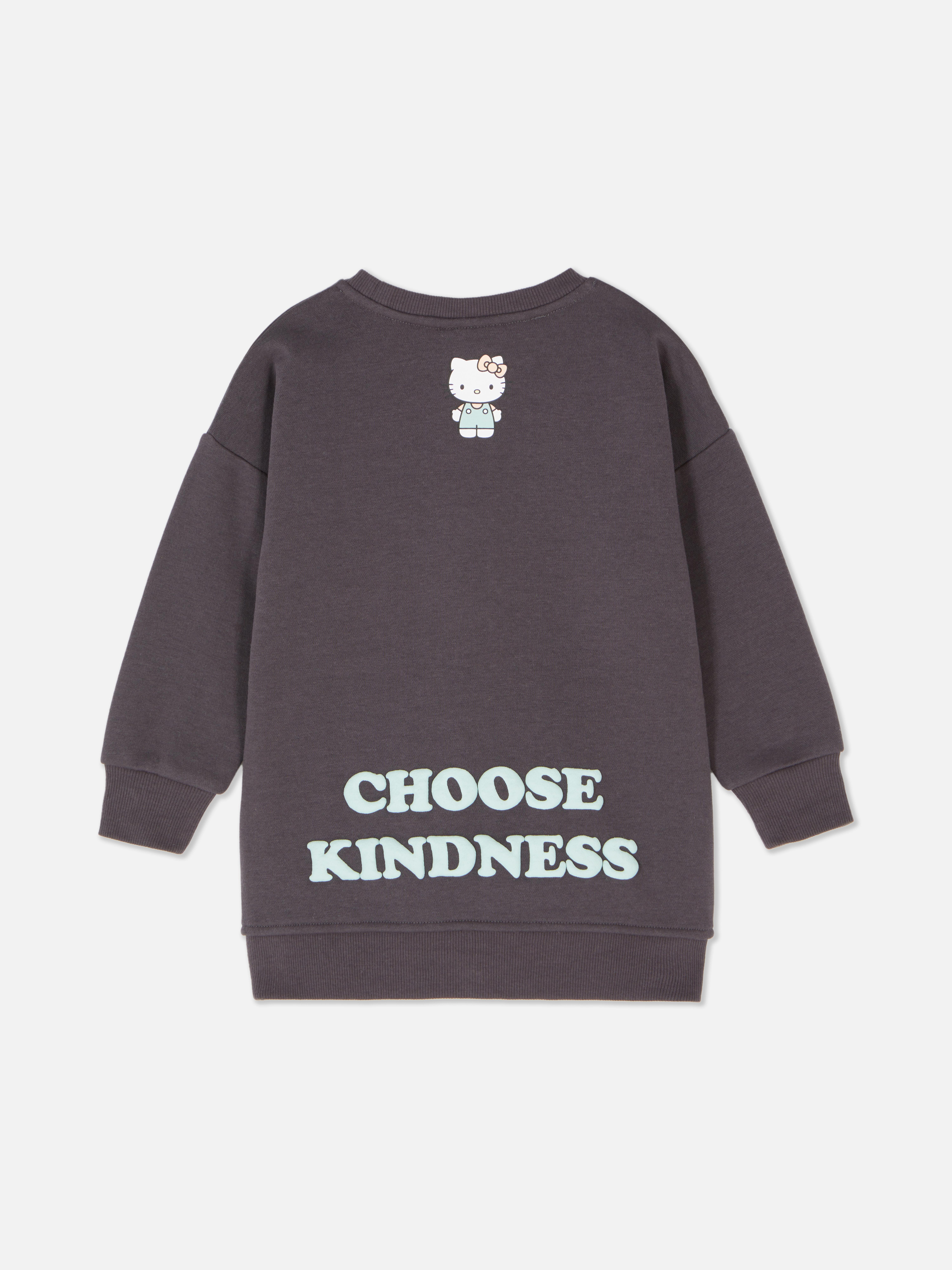 Sweatshirt mit Hello-Kitty-Schultertasche Ein langes Hello-Kitty-Sweatshirt mit einer passenden Tasche als Accessoire