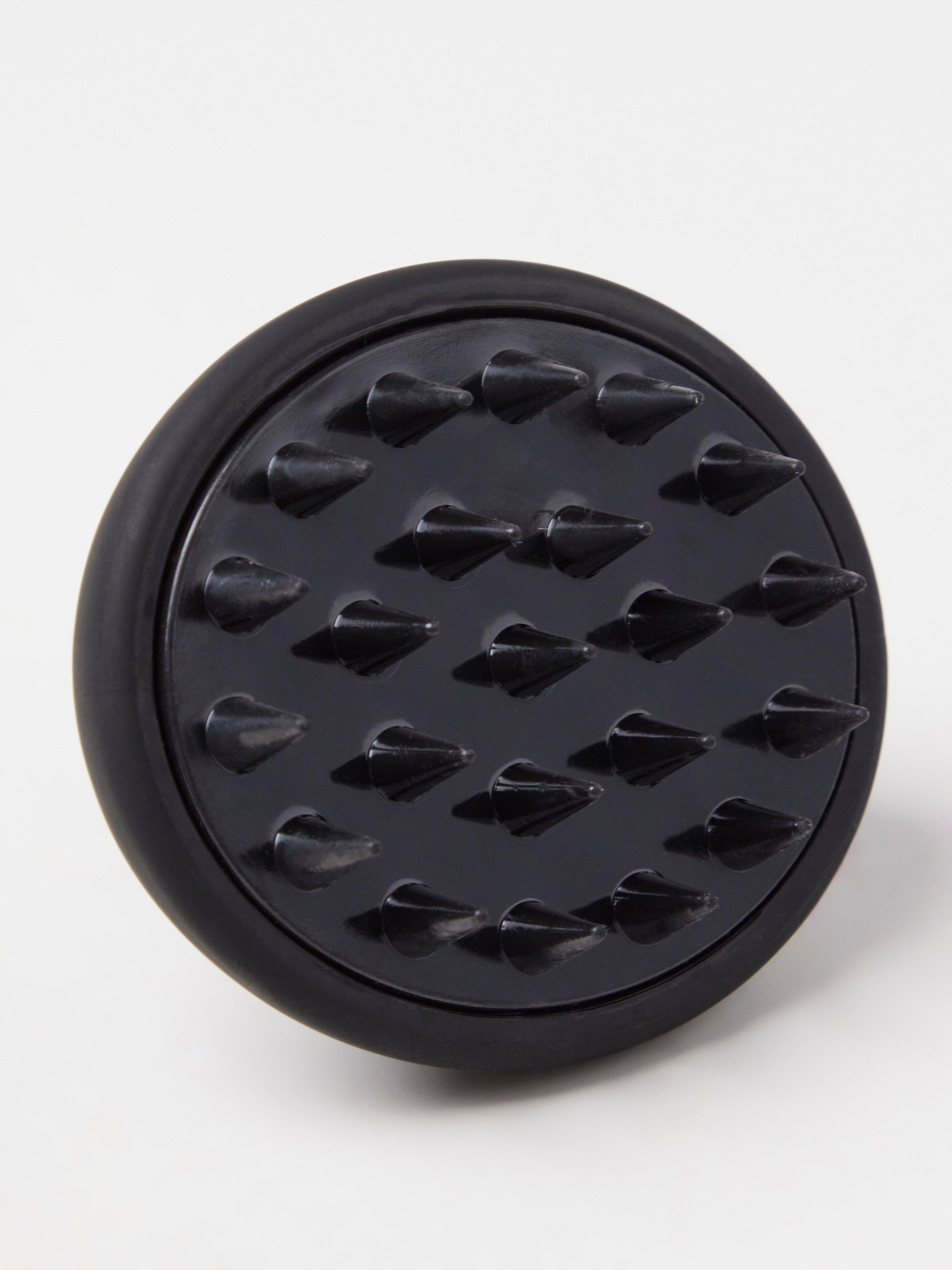 Cepillo de masaje para el cuero cabelludo negro