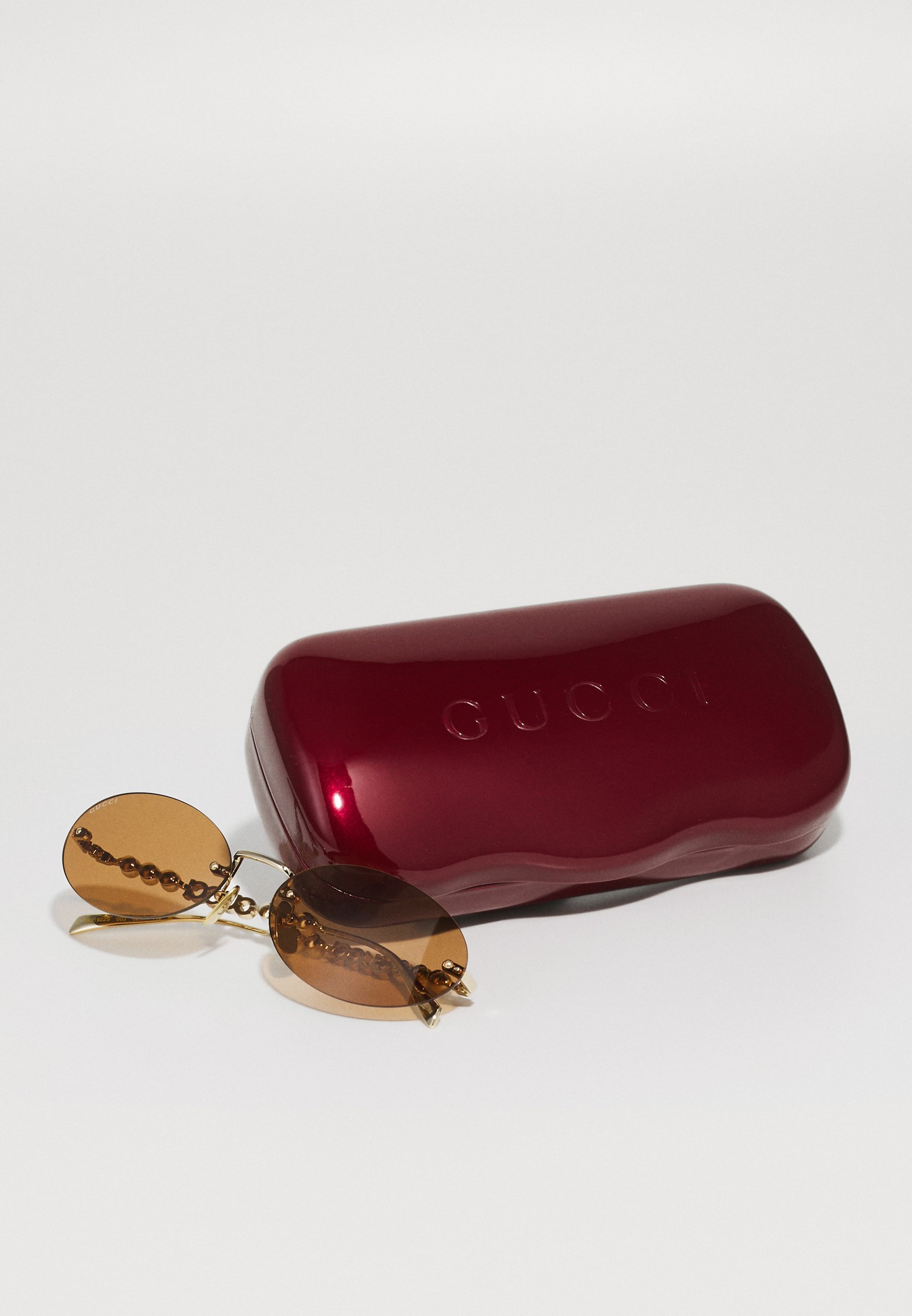 Lunettes de soleil Gucci - couleur or/marron