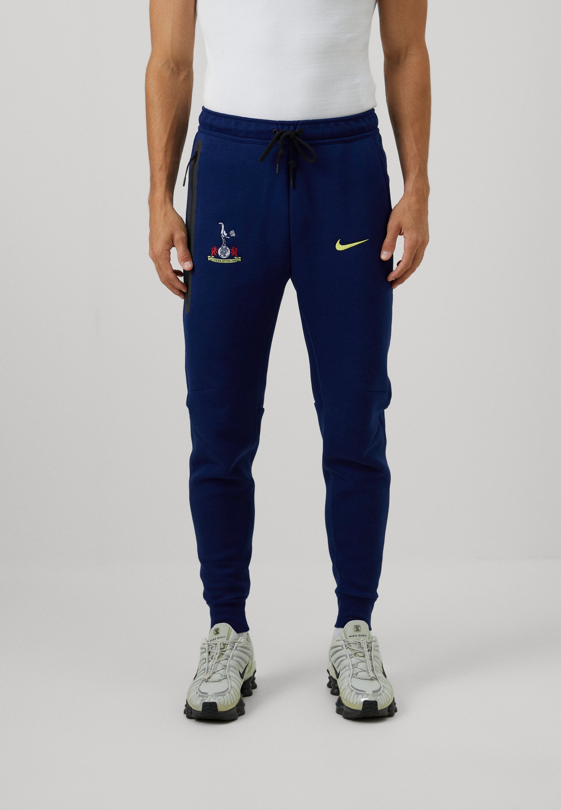 Nike Performance TOTTENHAM HOTSPUR TECH JOGGER HLAČE - Klubska odjeća - plava void/dinamički žuta