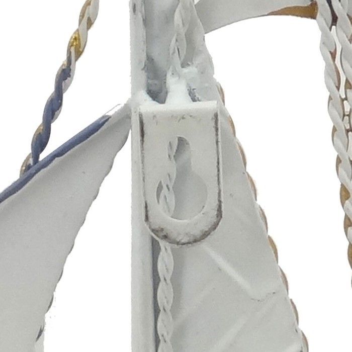 Metal wall decoration featuring sailboats and nautical motifs, measuring 79cm and available in grey, blue, green, and ecru.