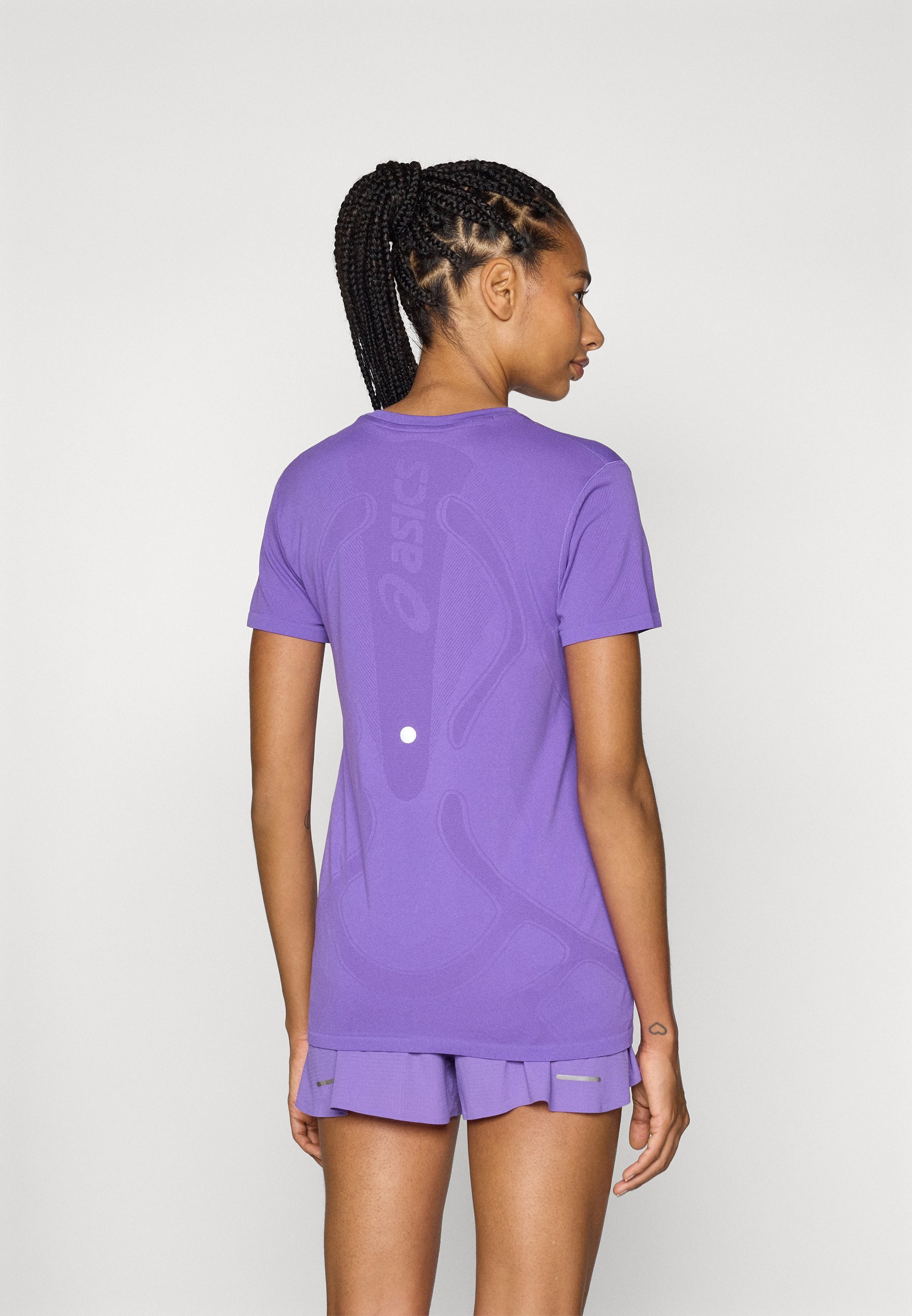 ASICS SEAMLESS TOP - T-shirt sportiva - viola edo