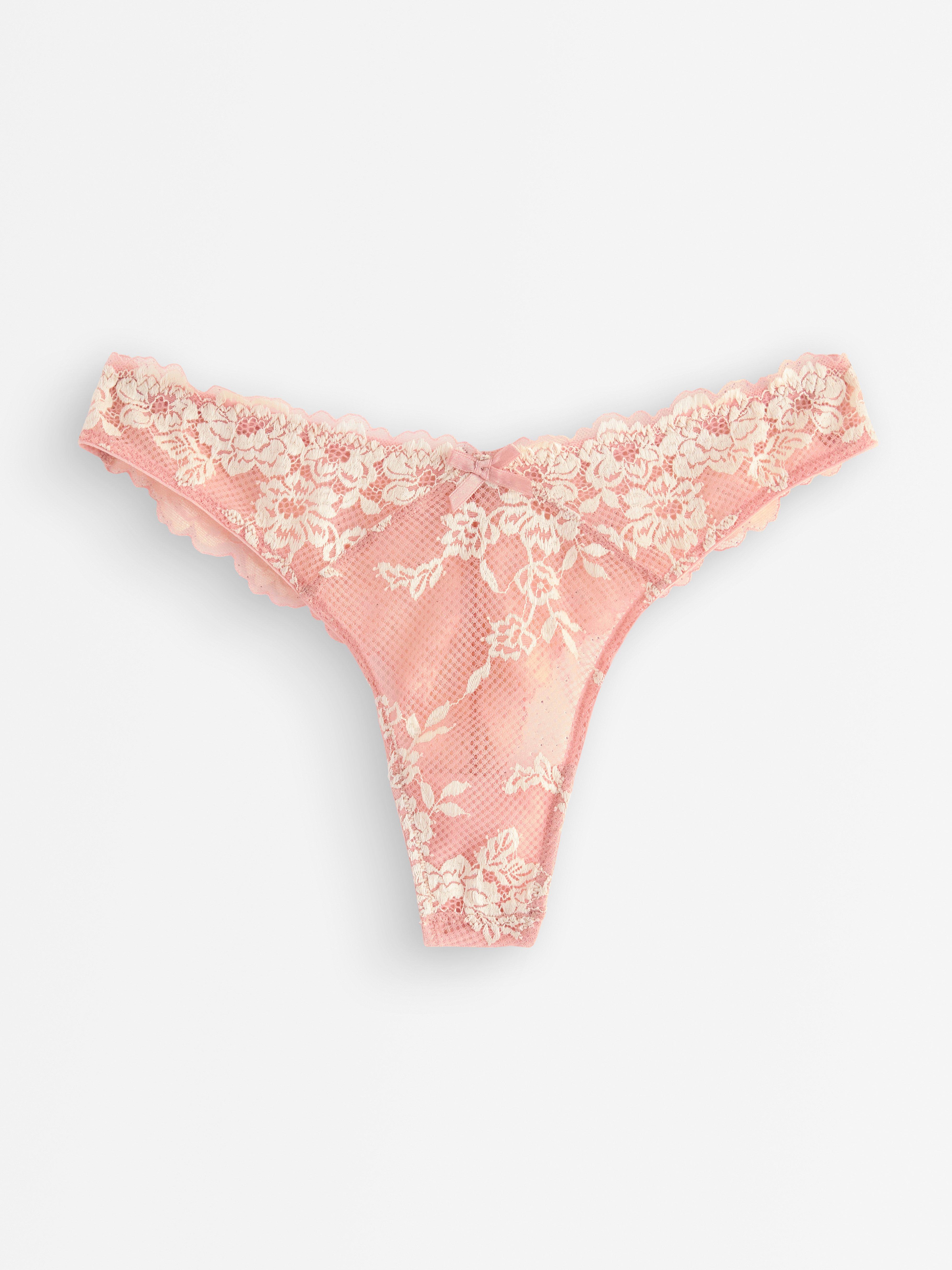 Calcinha fio dental de renda rosa claro