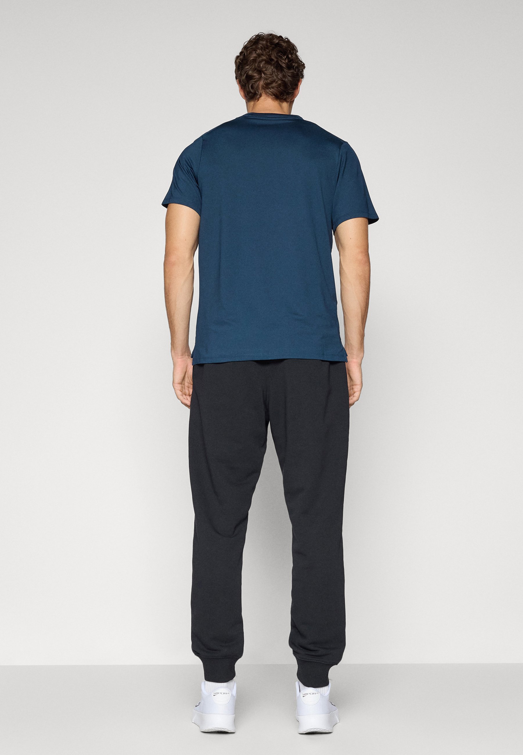 Nike Performance NIKECOURT HERITAGE JOGGINGPANT - Trainingsbroek - zwart