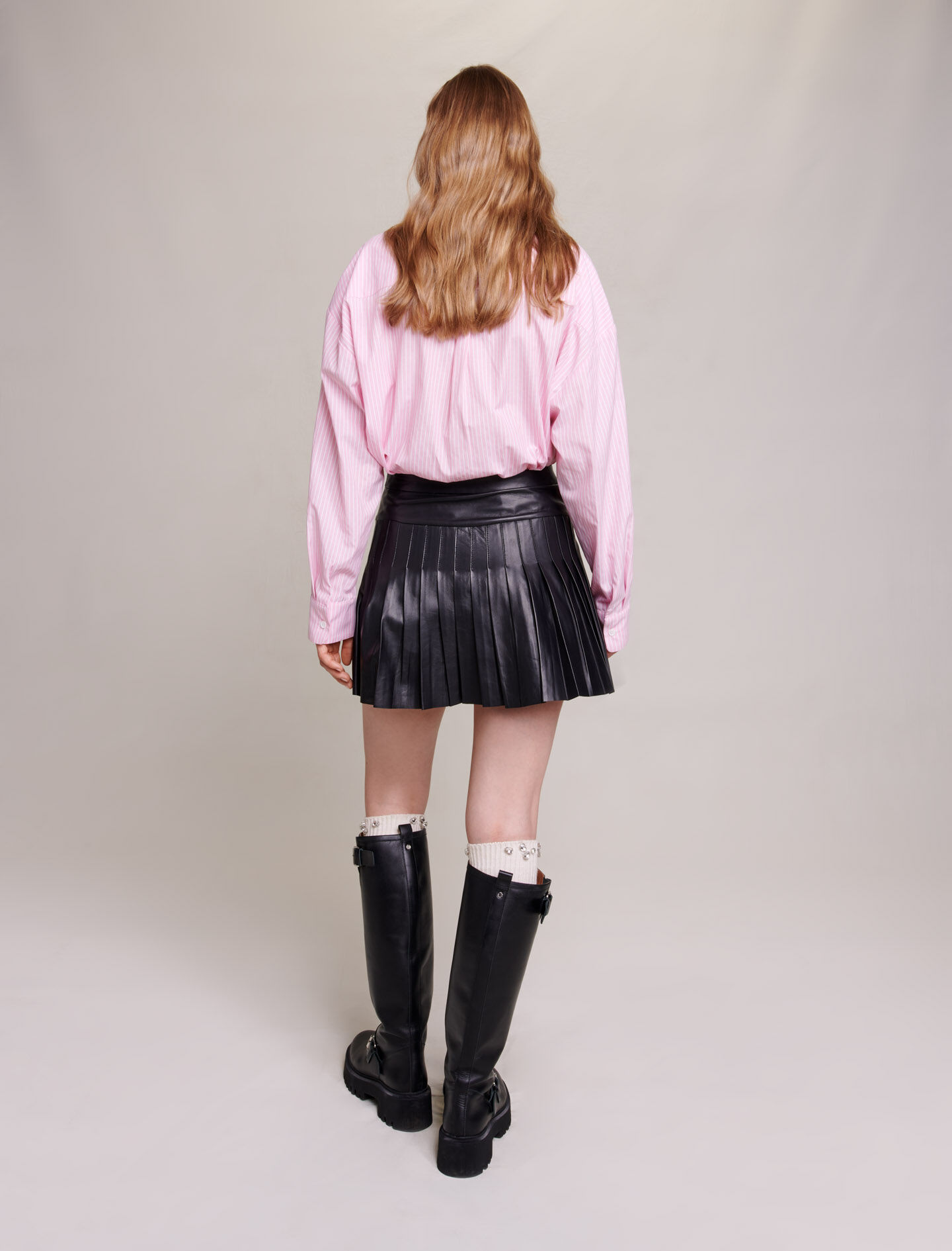 Uitlopende leren rok met plooien - Zwart